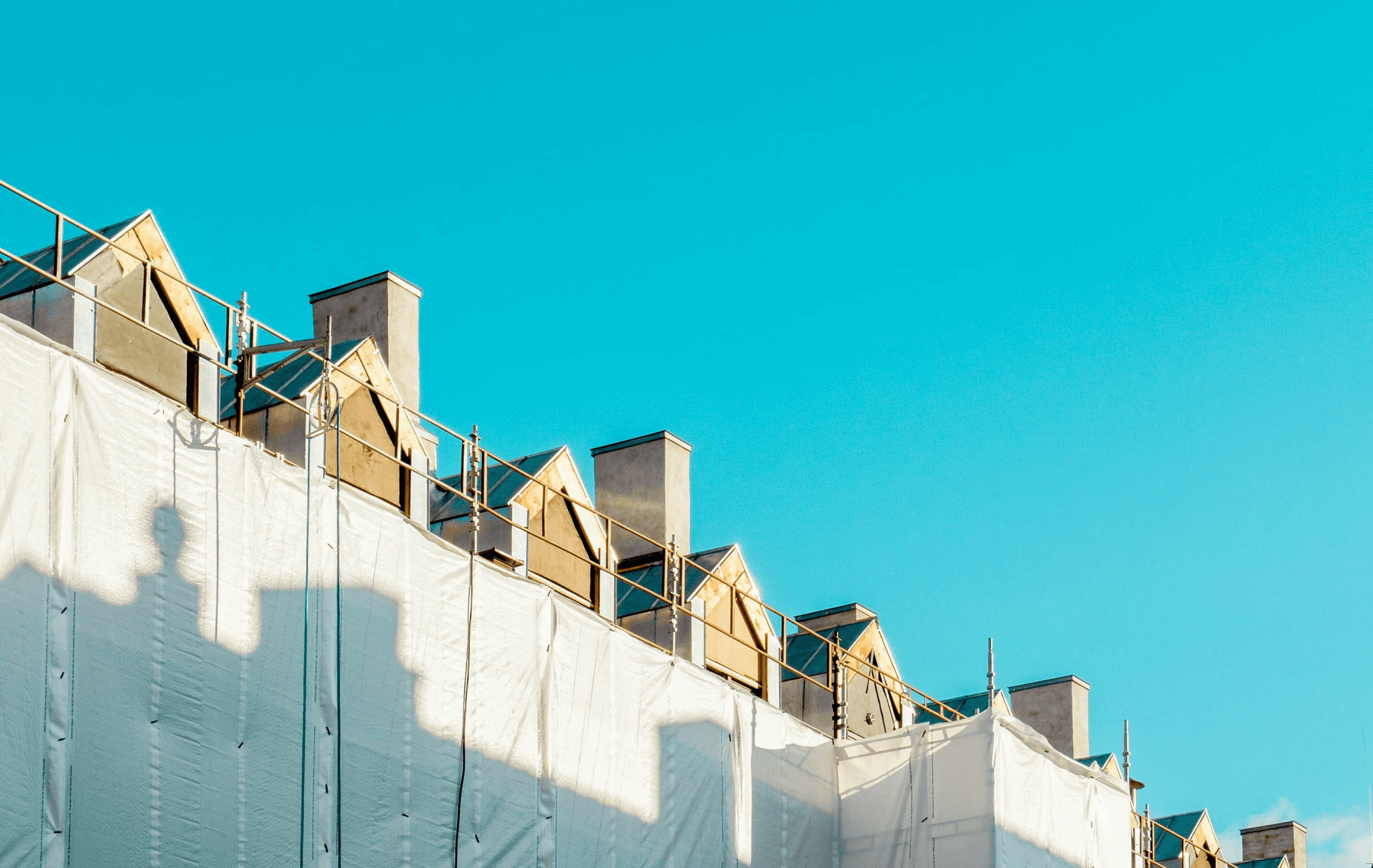 aerial photography of person trimming sports field during day