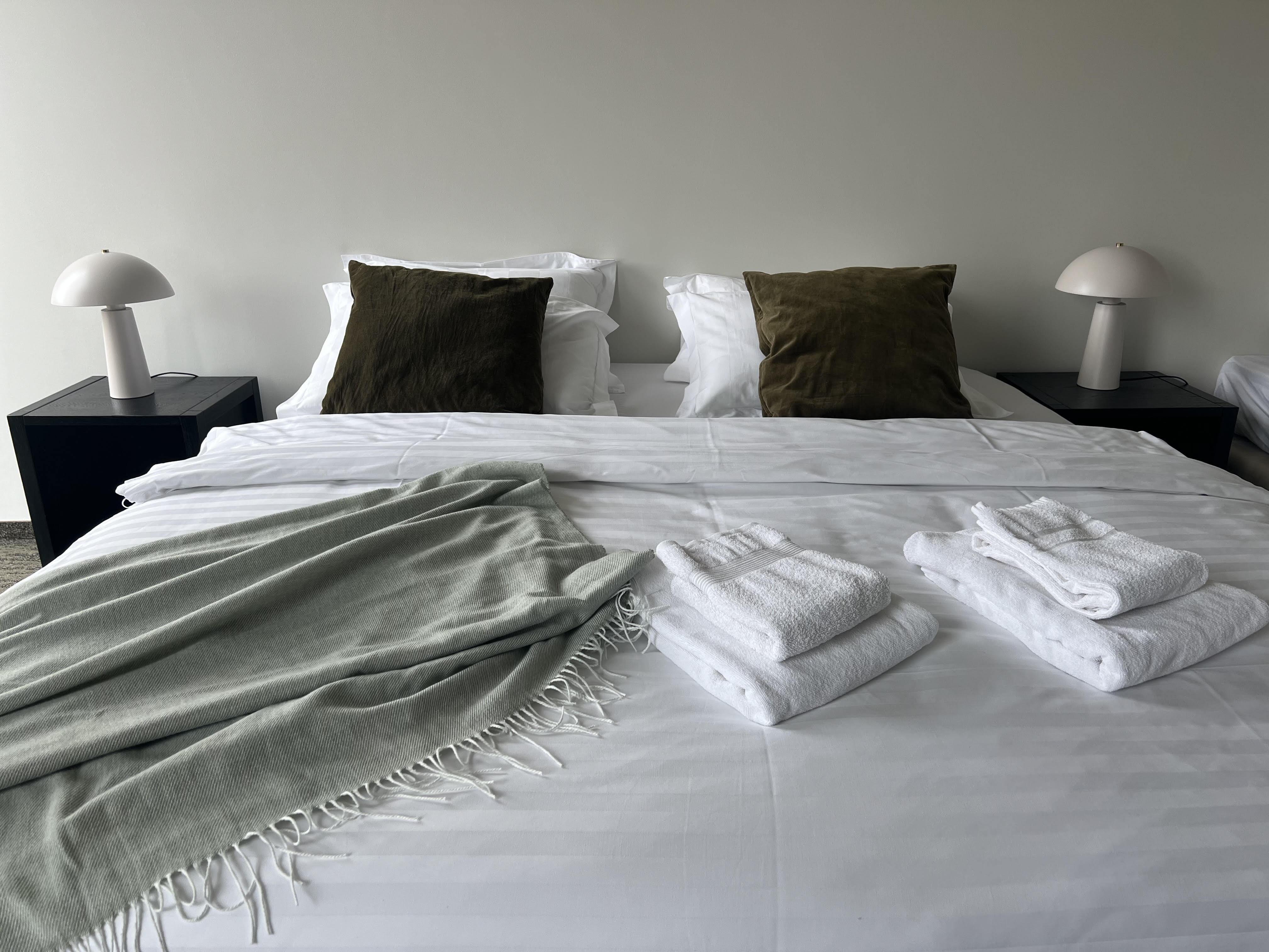 Triple Room Bed at Hotel Bifröst with mountain view