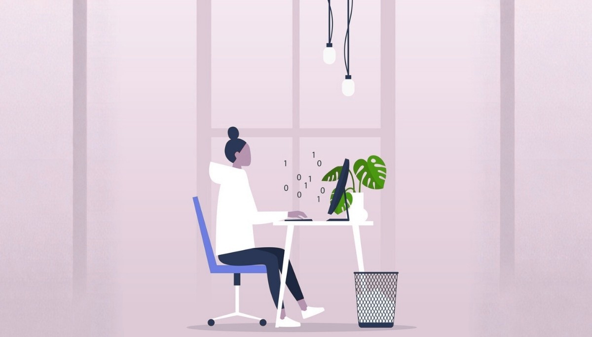 Illustration of a professional working remotely on a laptop with binary code floating from the screen.