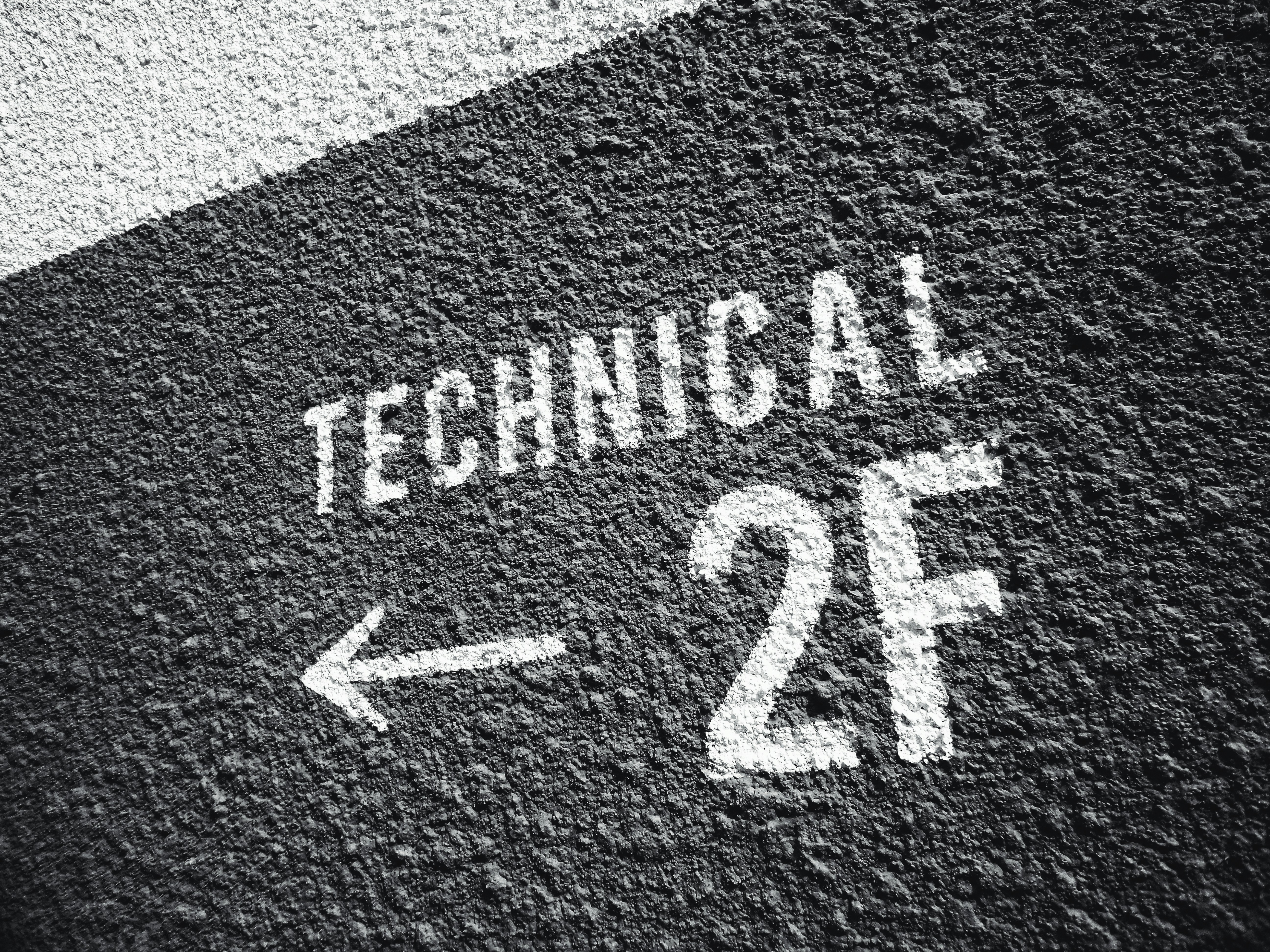 image of a sign that says technical points to room 2F