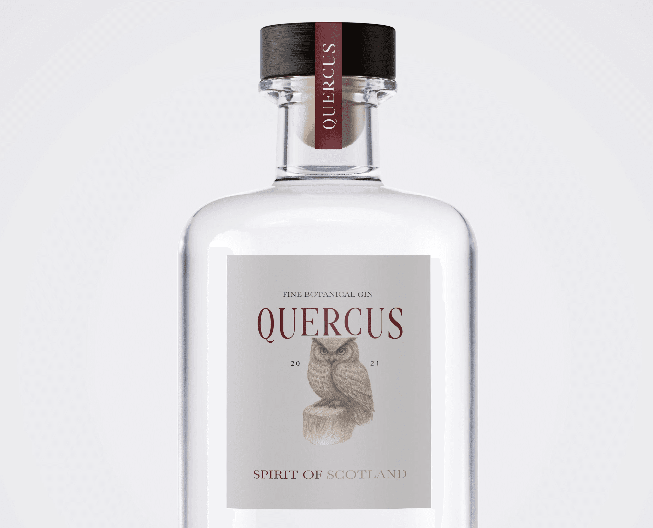 Features a bottle of gin called Quercus Gin, that has a handrawn picture of an owl with the Quercus Logo design above. The bottle top is black with a Quercus Logo red strip.