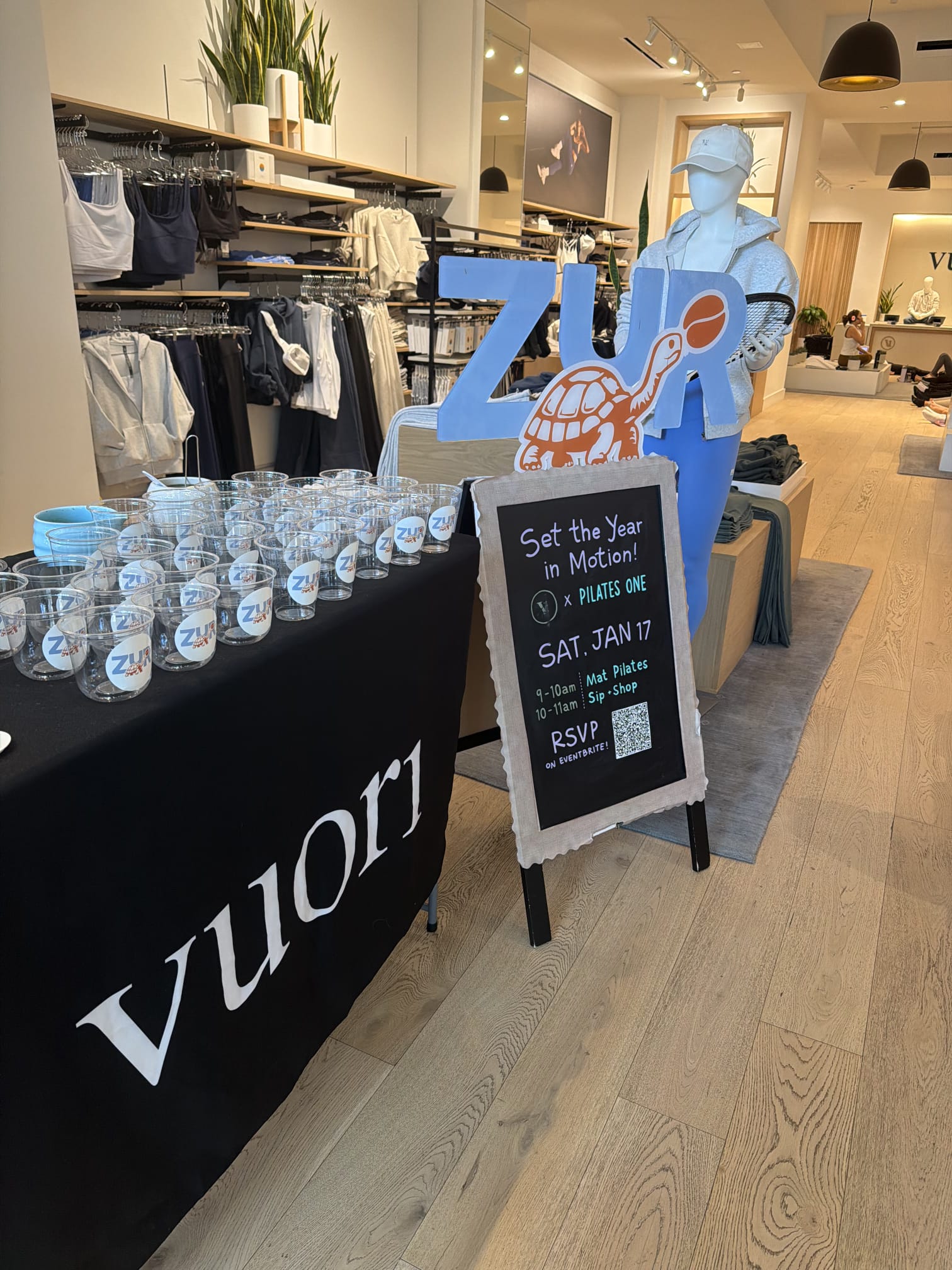 Barista in mask preparing coffee with moka pot
