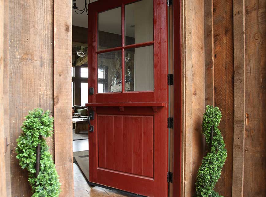 Interior of a warm, modern café rendered in line-art style with high ceilings, pendant lighting, and wood and metal furnishings.