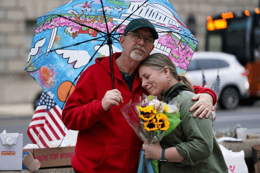 Sad couple in the rain