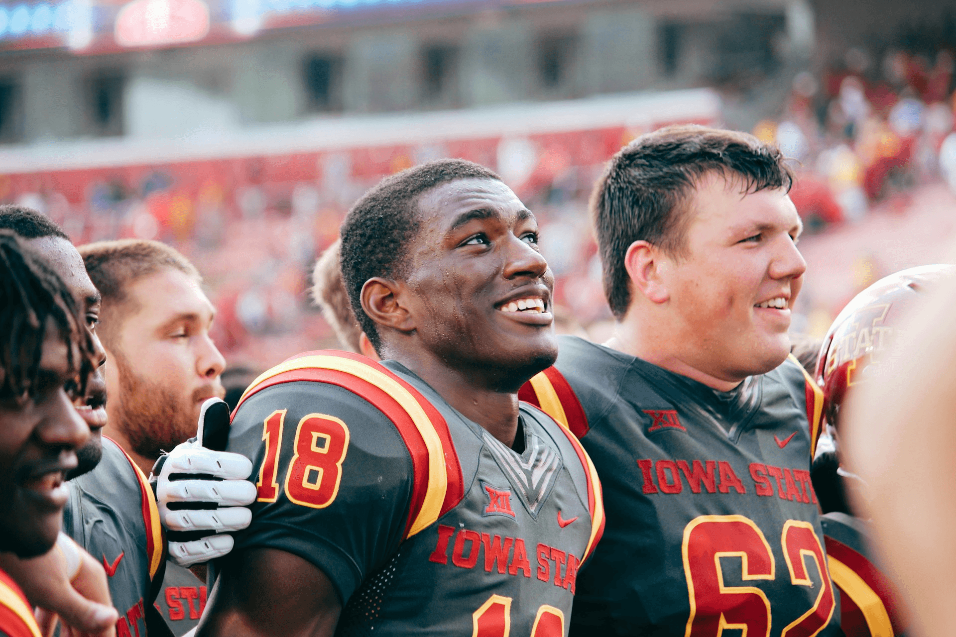 Football Player Lookign Happy after a Win