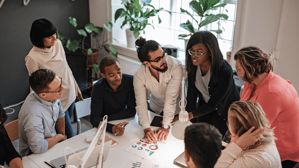 A customer service team discussing ways of improving online customer experience