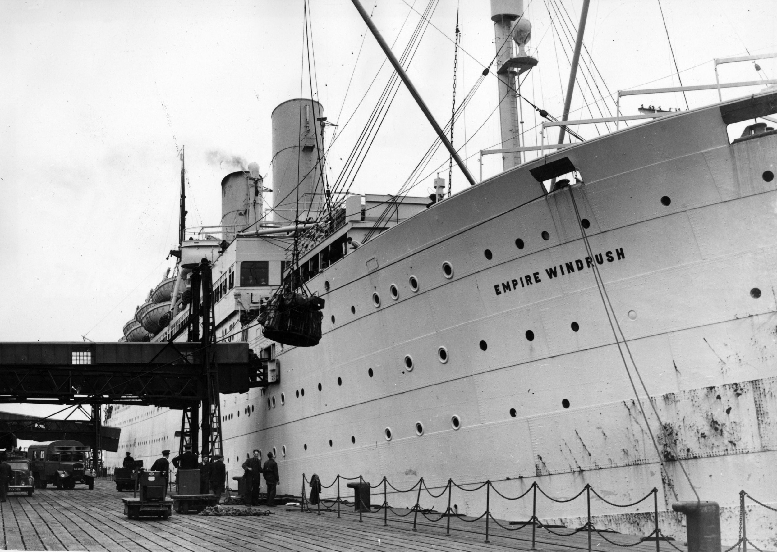 Close-up of a blue microscopic structure resembling a virus with detailed surface textures.
