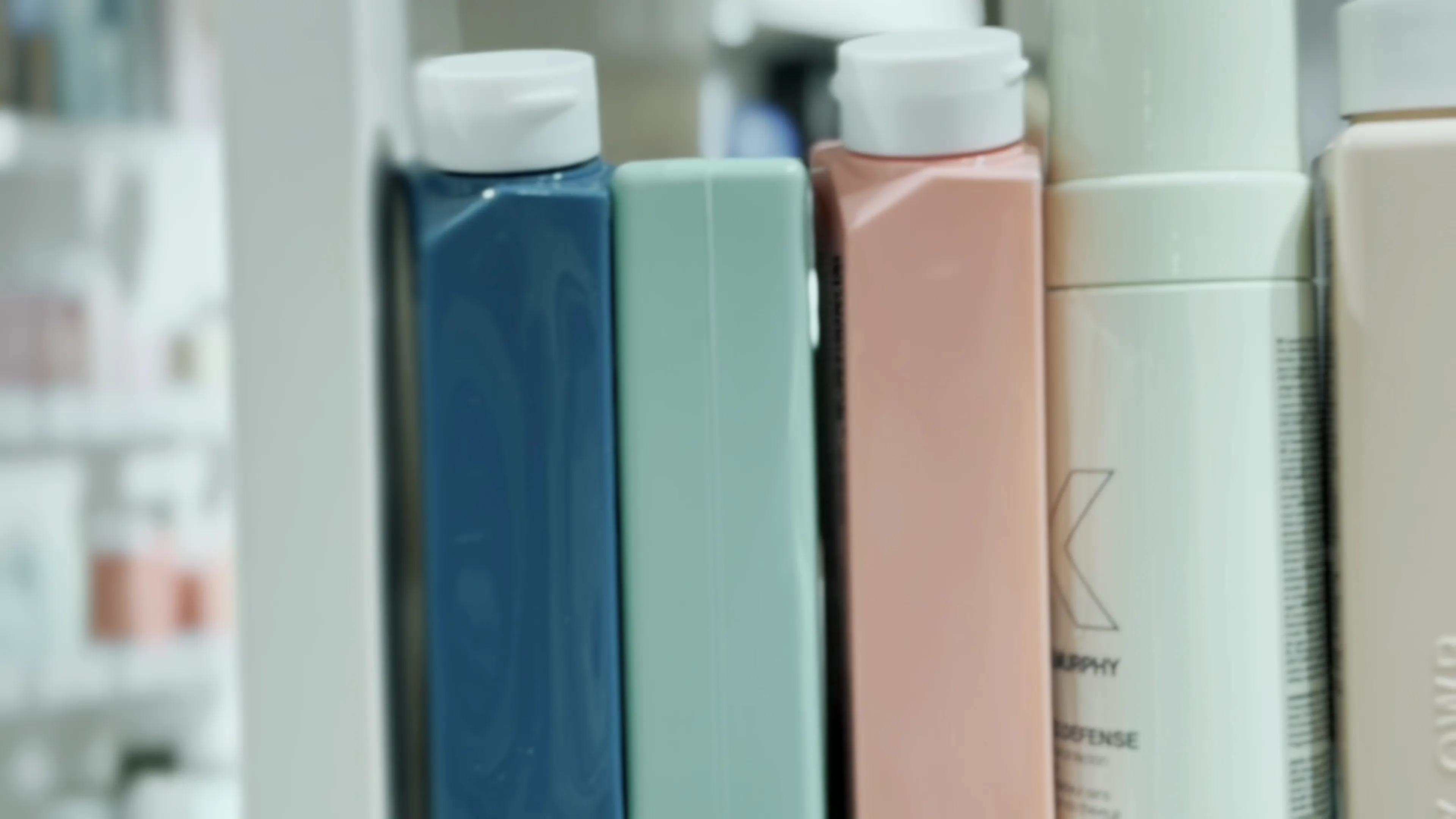Close-up of colourful haircare products inside the Frisörerna salon.