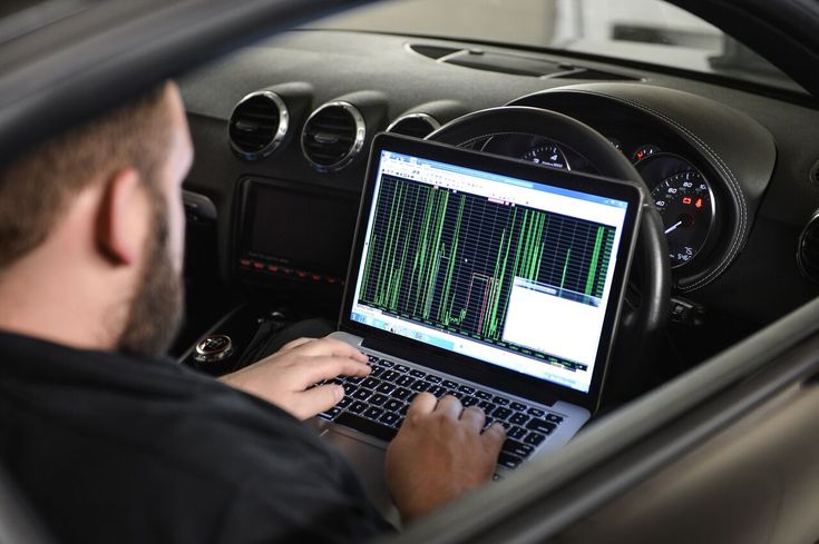man in long sleeve shirt sitting on chair