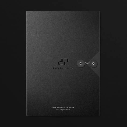 Minimalist brand identity for Design Point, showcasing a premium black textured brochure with a custom 'DP' logo and architectural design branding.