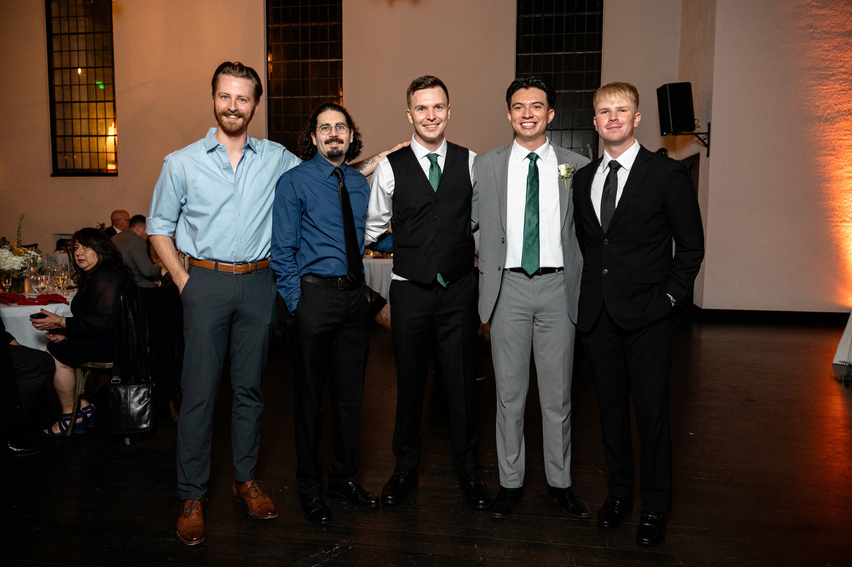 Flat lay wedding details with bouquet, rings, and sparkling bridal heels