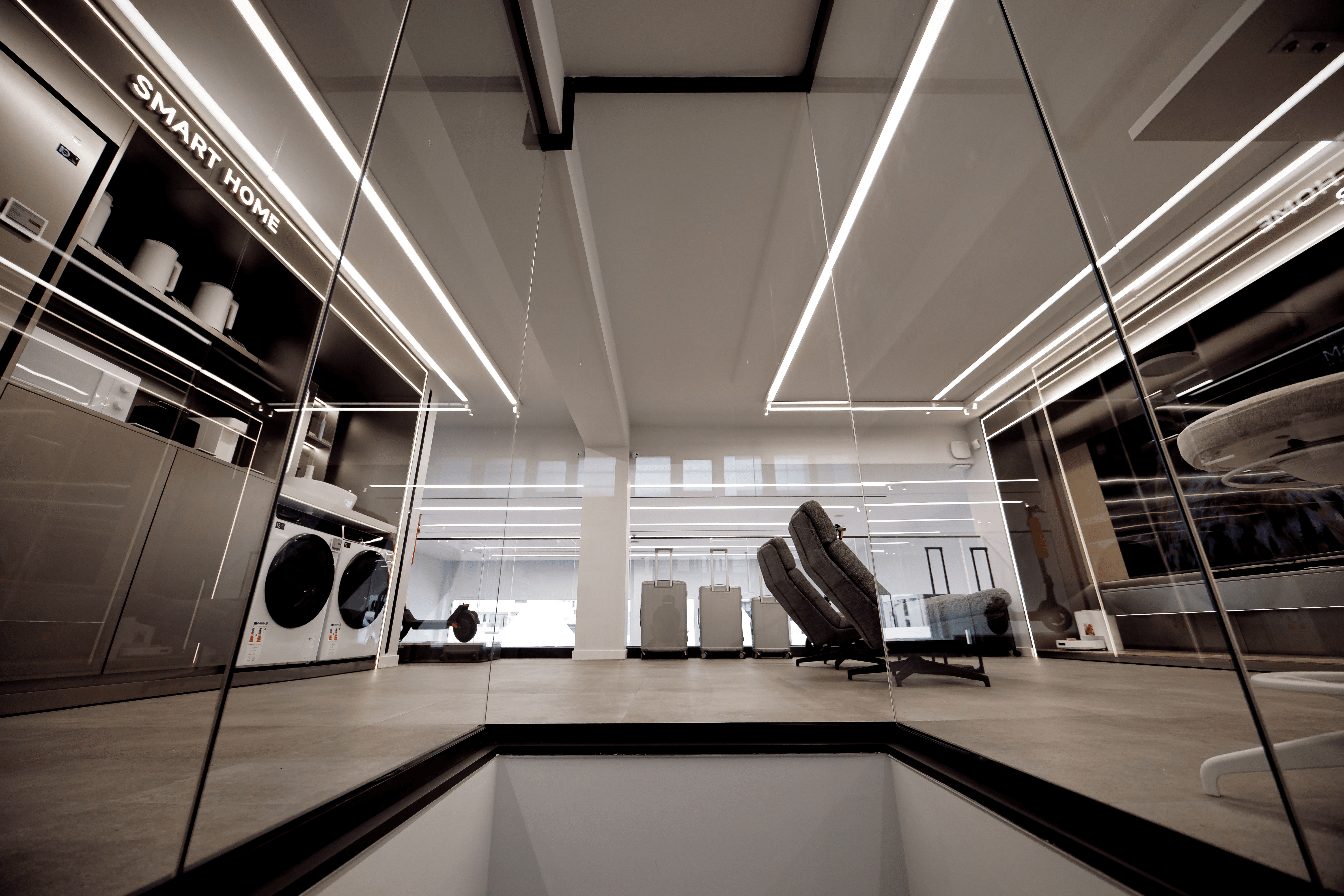 Xiaomi Flagship Store in Limassol with smart home showroom area, glass displays, and linear lighting