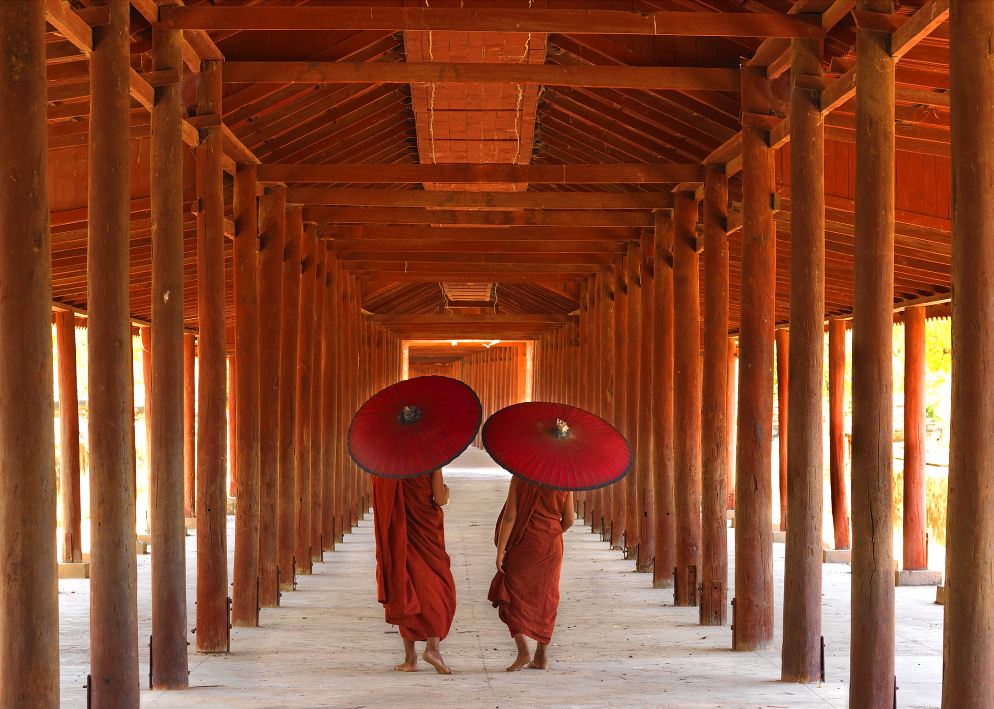 Two Parasols in Burma: Tranquility in a Sea of Red