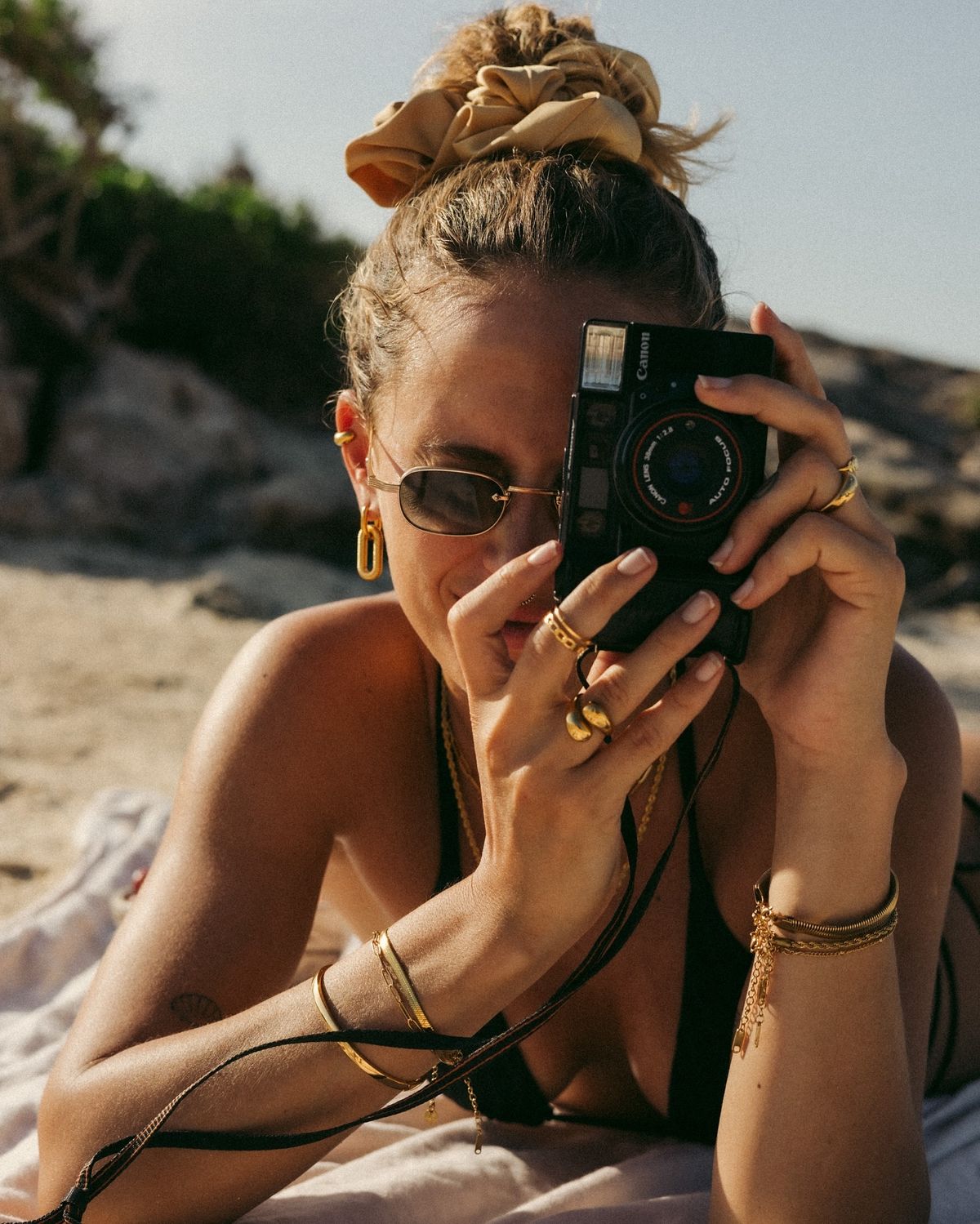 man sitting on gray concrete wall