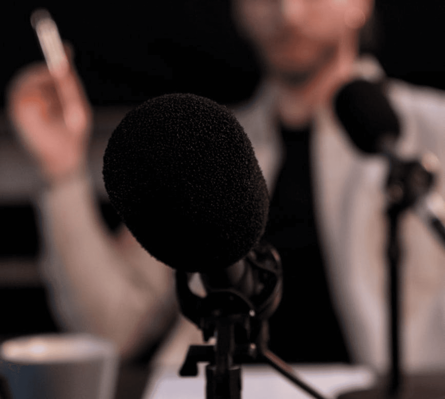 a man filming a podcast
