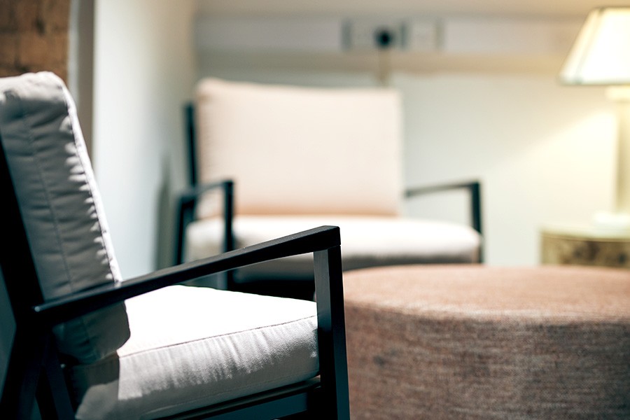 Stylish chairs and coffee tables in a small private office