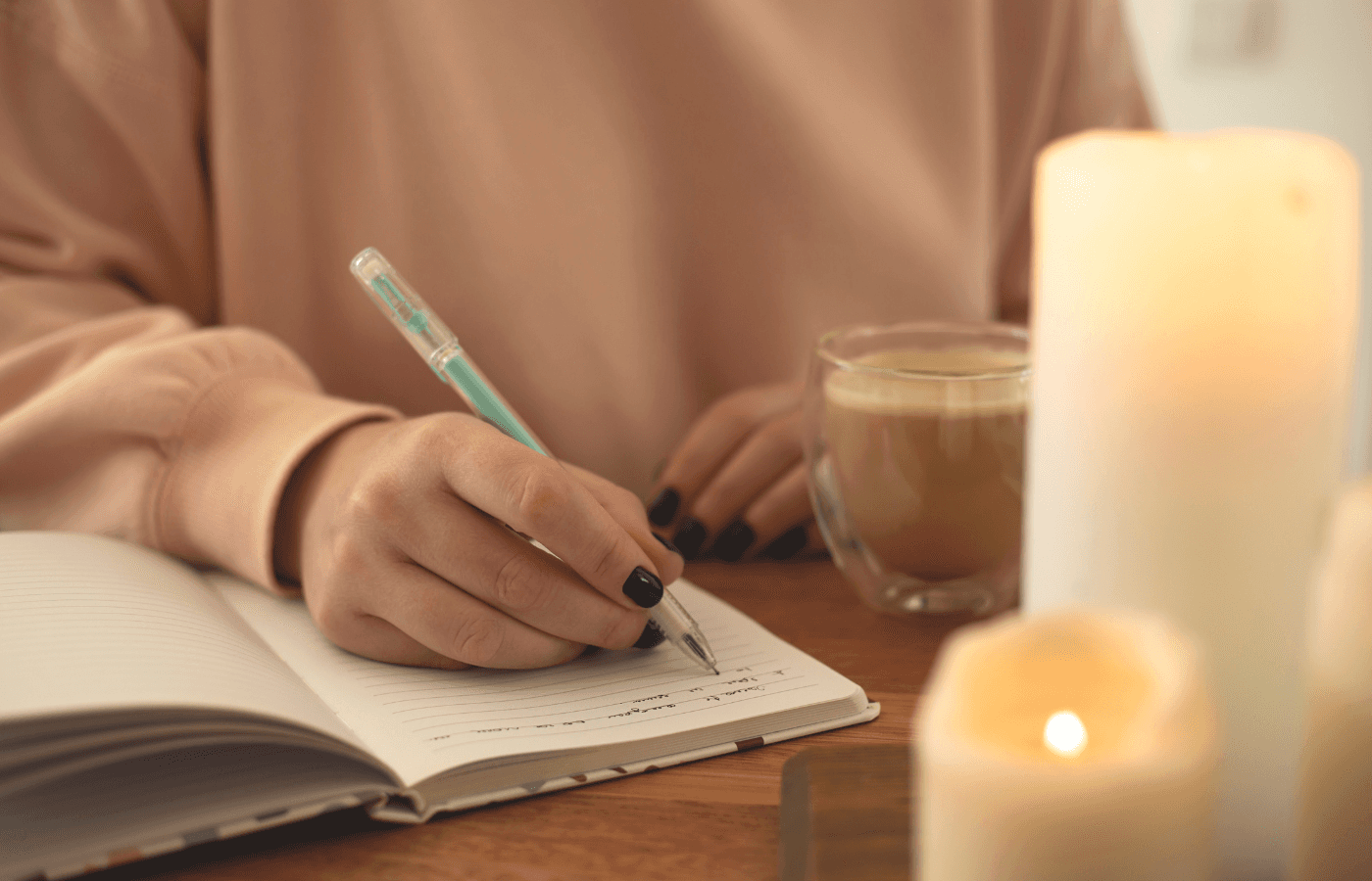 woman writing in notebook