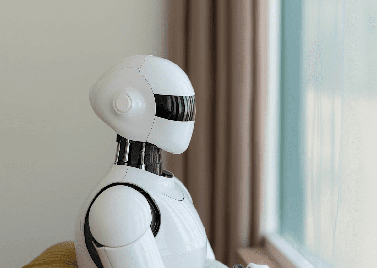 black flat screen computer monitor on brown wooden desk