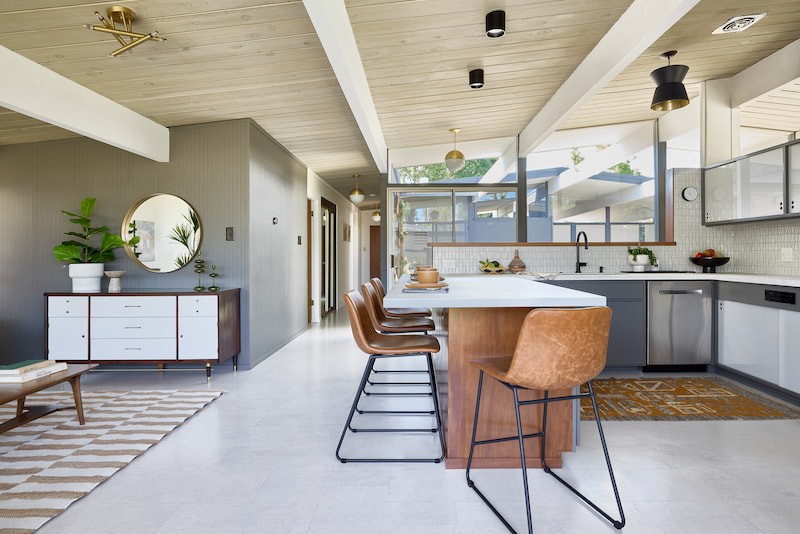 Wide-angle view showcasing the full layout and design of the open kitchen in the Fairhaven Eichler Tract remodel