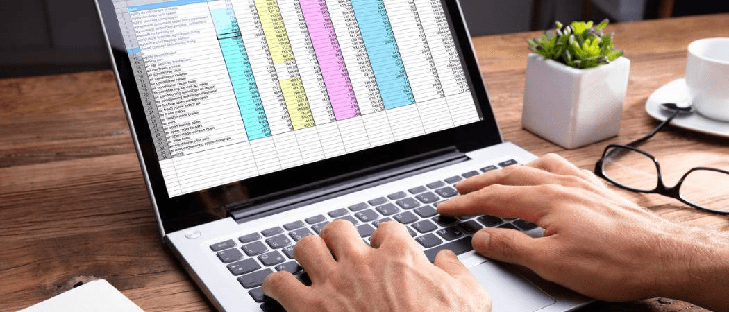 Typing on a spreadsheet laptop -  Integrate Agent With Google Sheets