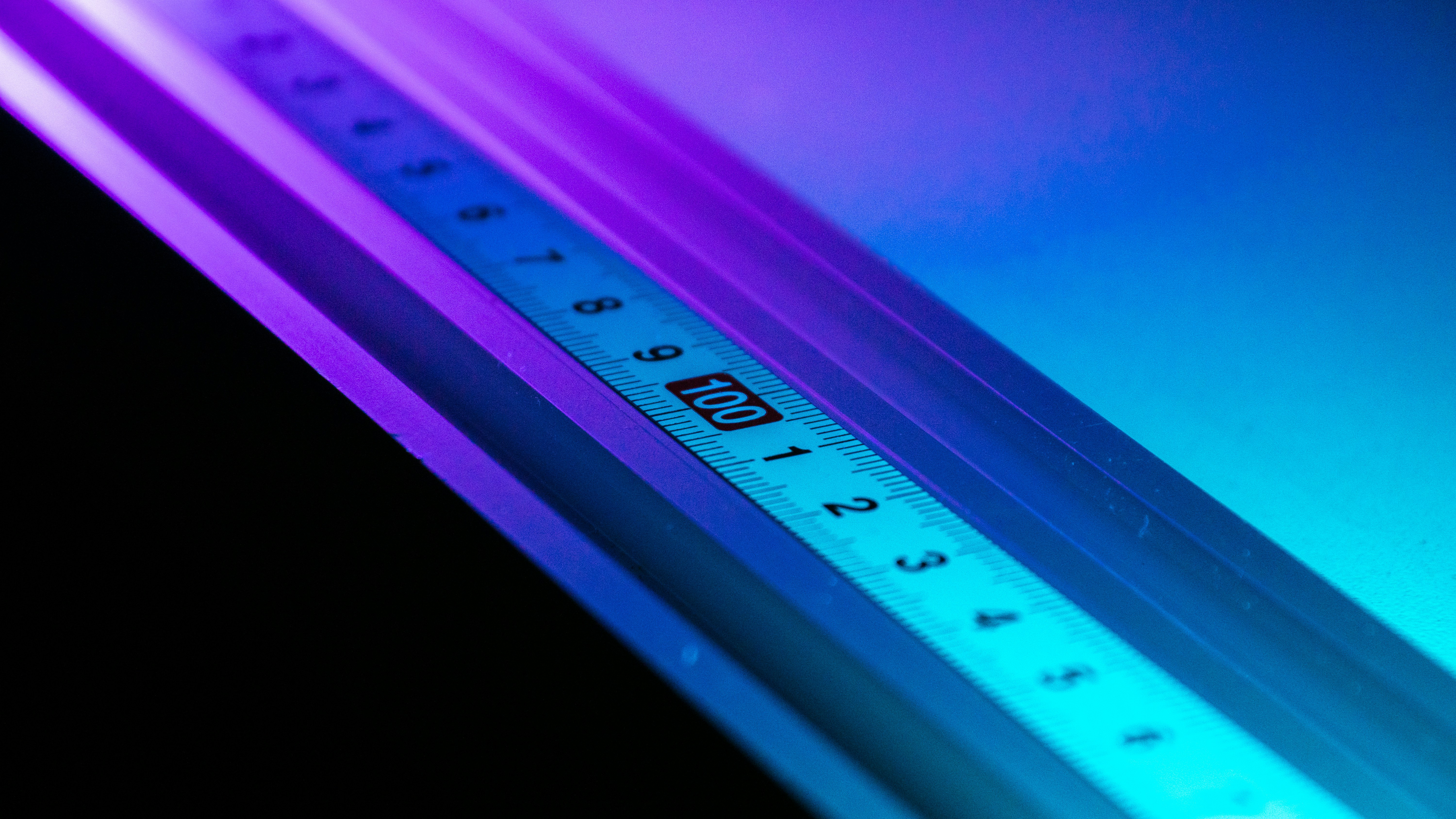 A close up of a blue and purple light