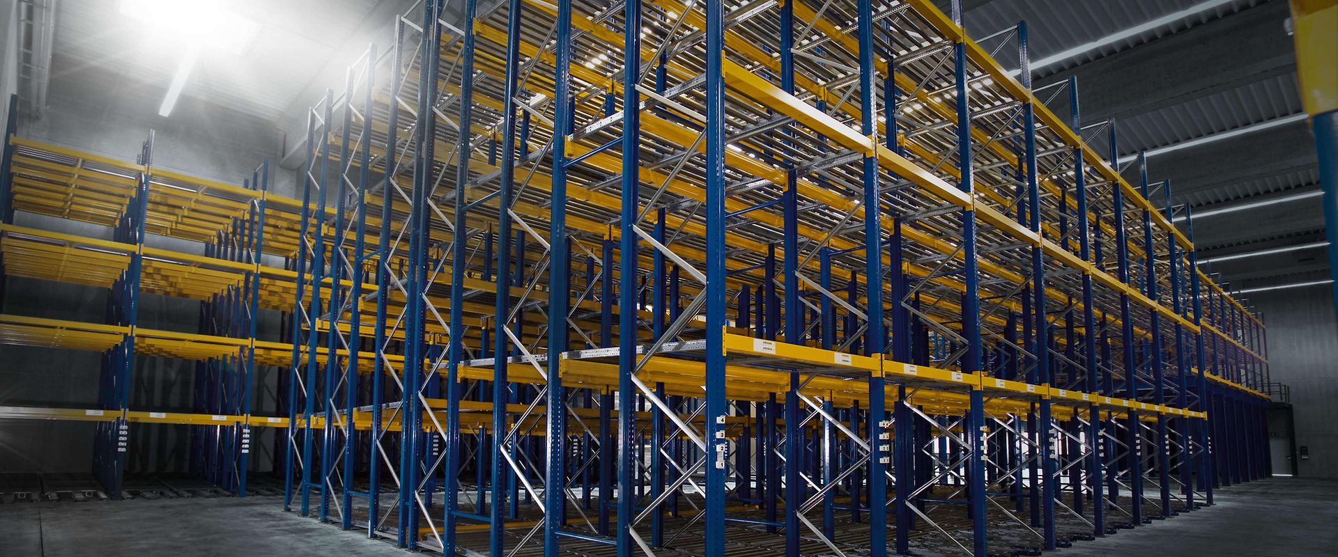 Two cheerful men laughing in the front seats of a sportscar, great for car rental joy promotions.