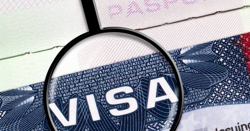 A passport with a tourist visa stamp.