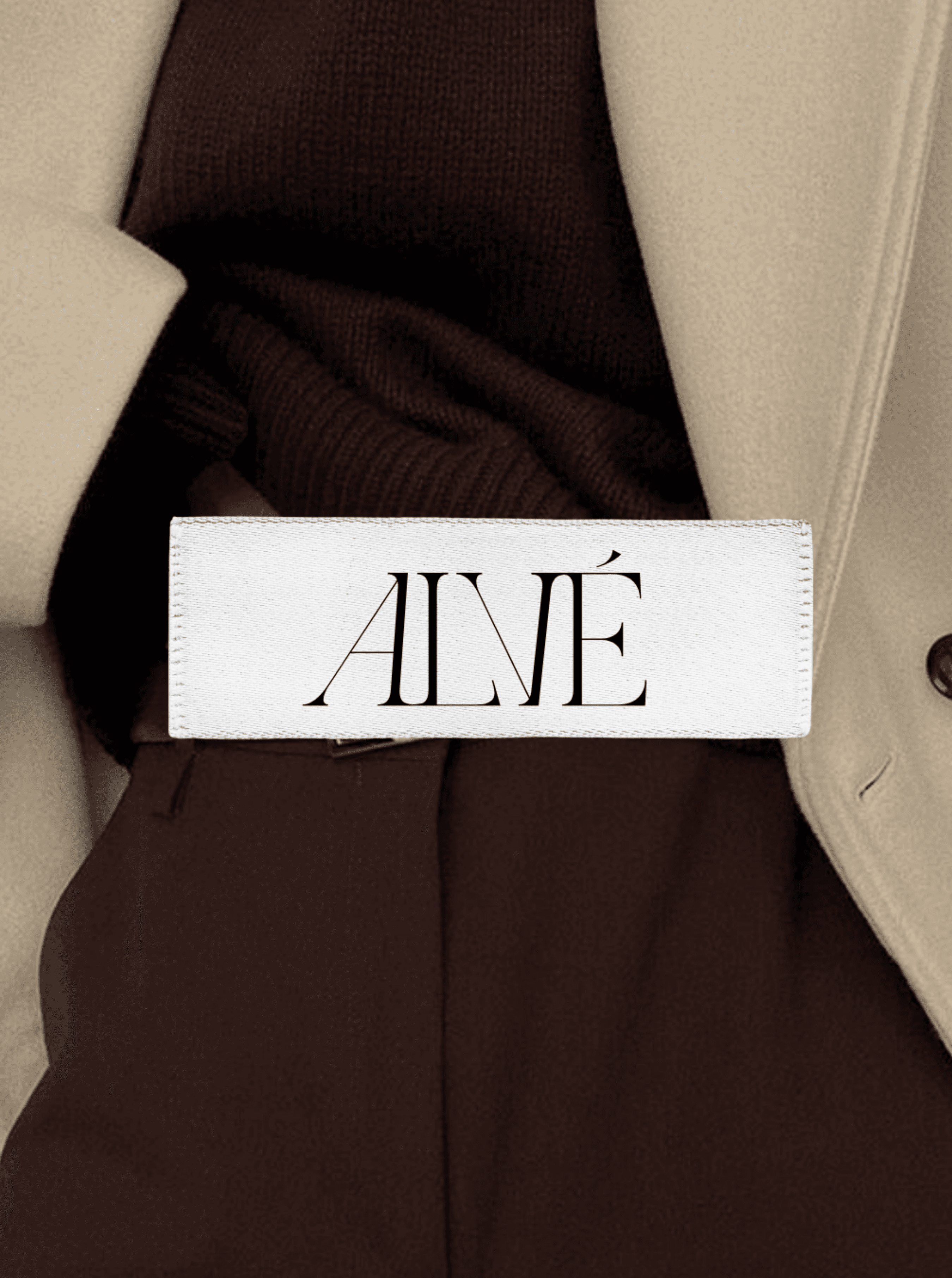 A tag mockup with logo on it for an editorial clothing brand.