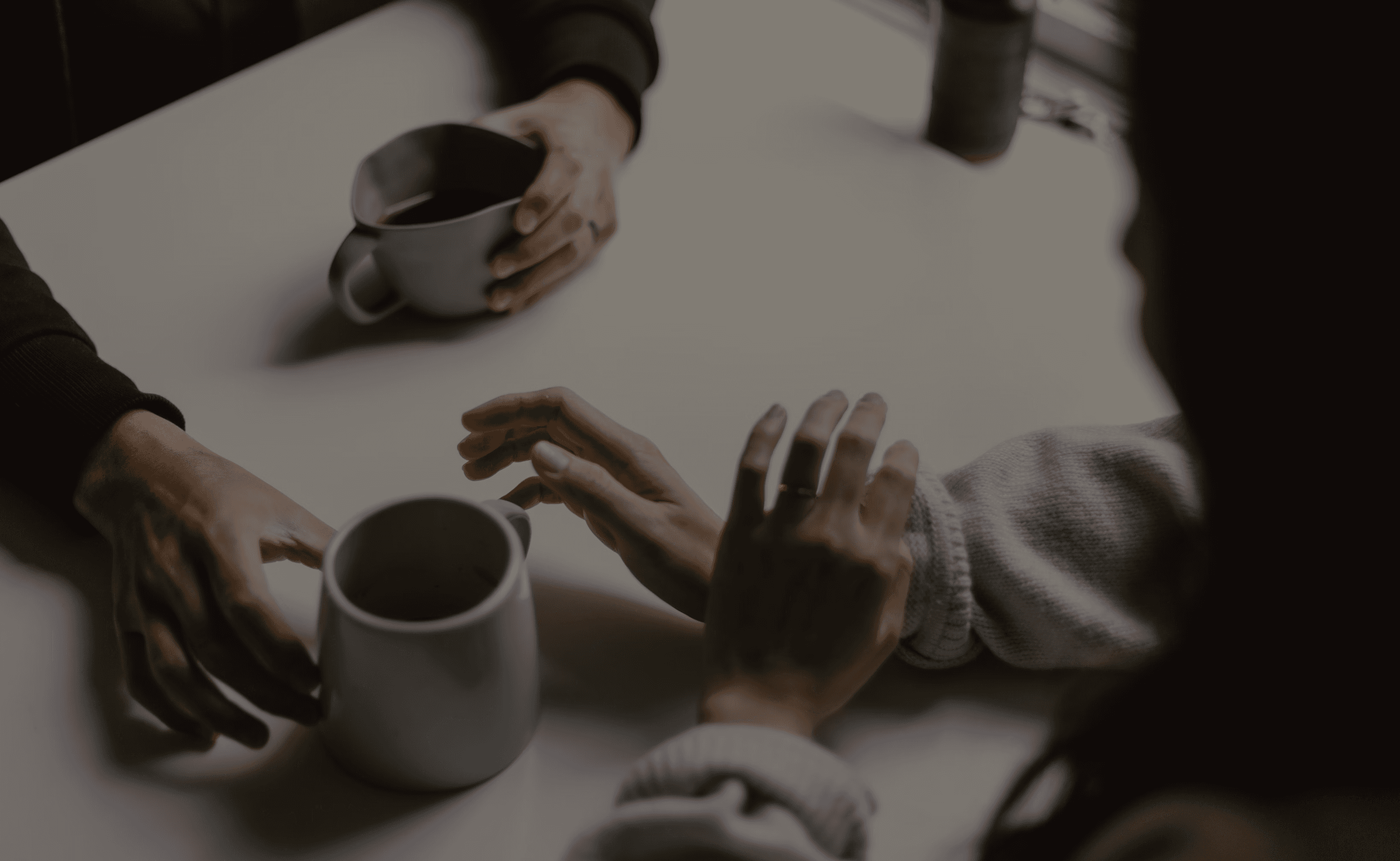 Hero image – hands and coffee cup