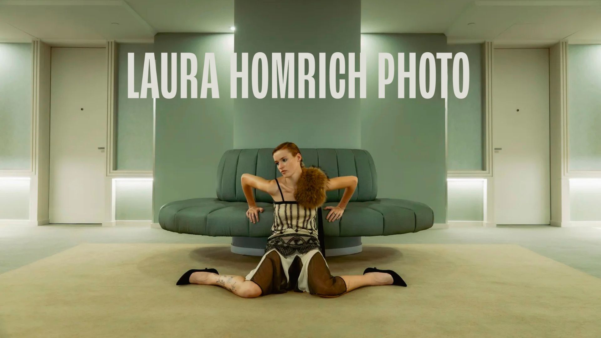Fashion photographer brand identity for Laura Homrich Photo featuring an editorial portrait in a modern interior, showcasing clean typography and high-end visual direction.