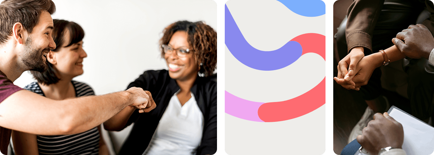 A diverse group of smiling people sharing a fist bump in a casual indoor setting
