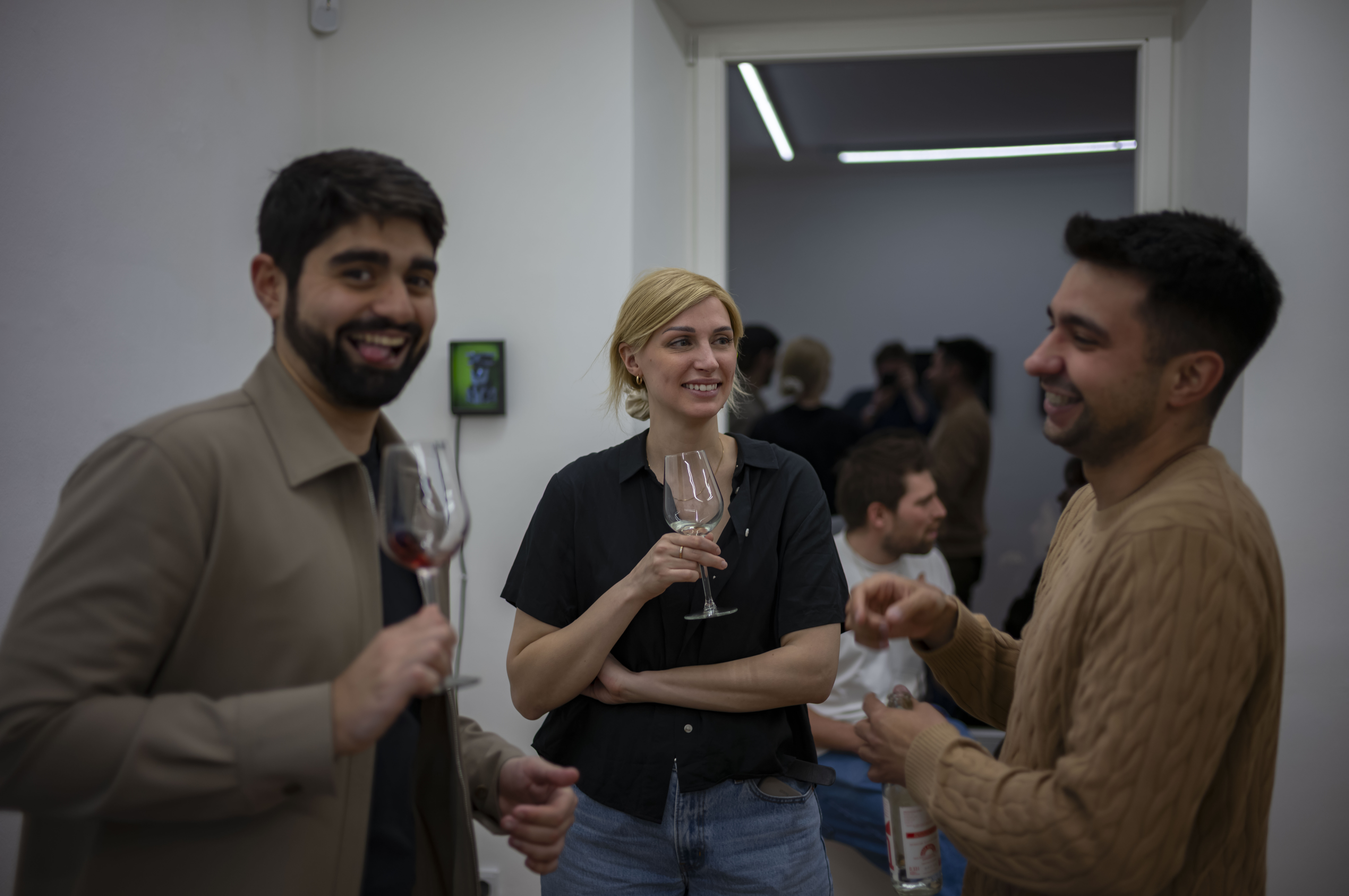 Entrepreneurs engaging in a lively discussion during a Bizz Buzz networking event.