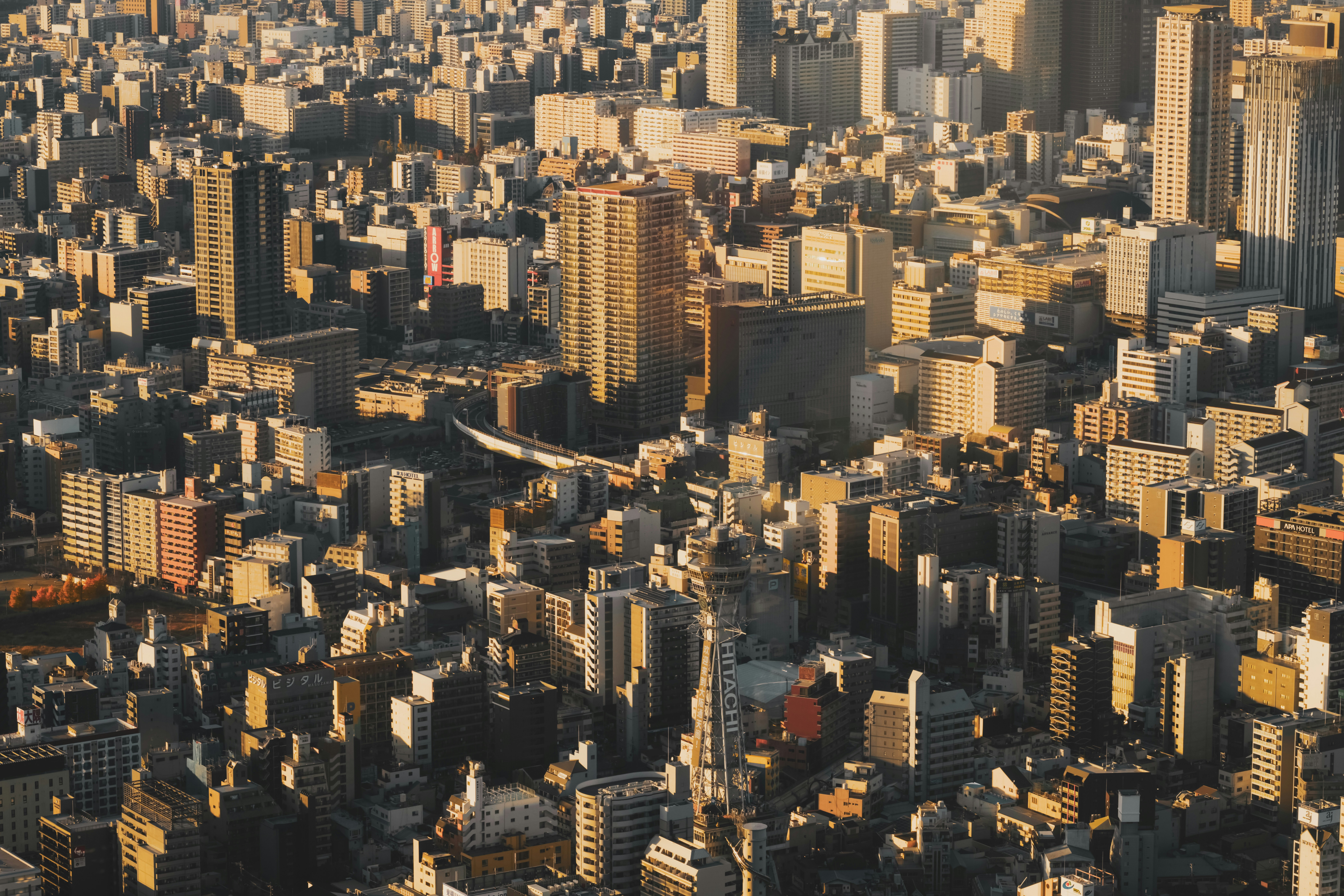 Aerial view of a dense cityscape with tall buildings.