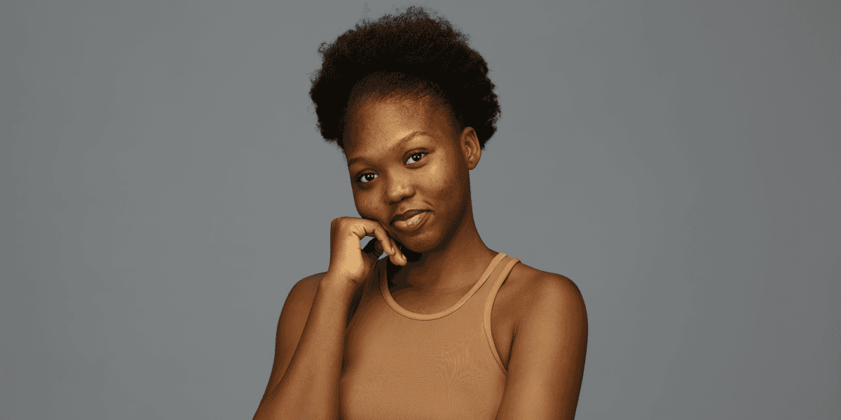 A Ghanaian woman happy with her acne treatment