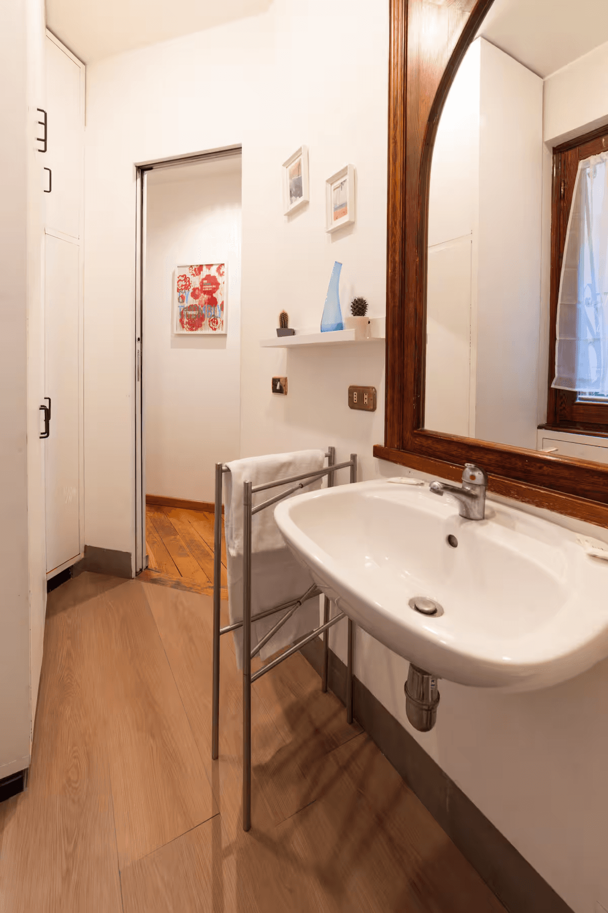Gray sectional sofa with black coffee table and blue rug