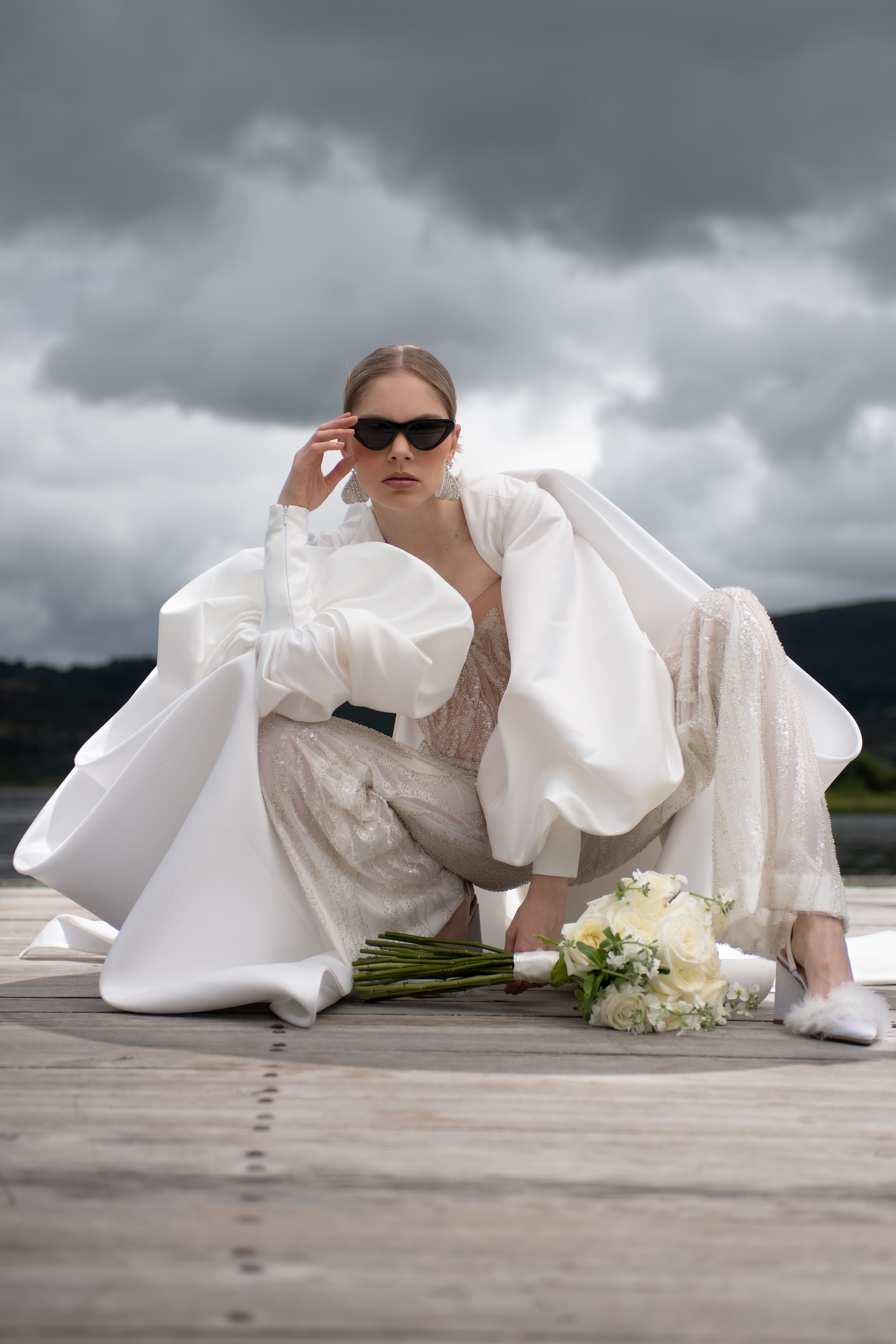 Artistic fashion portrait with colorful geometric shapes and avant-garde red styling