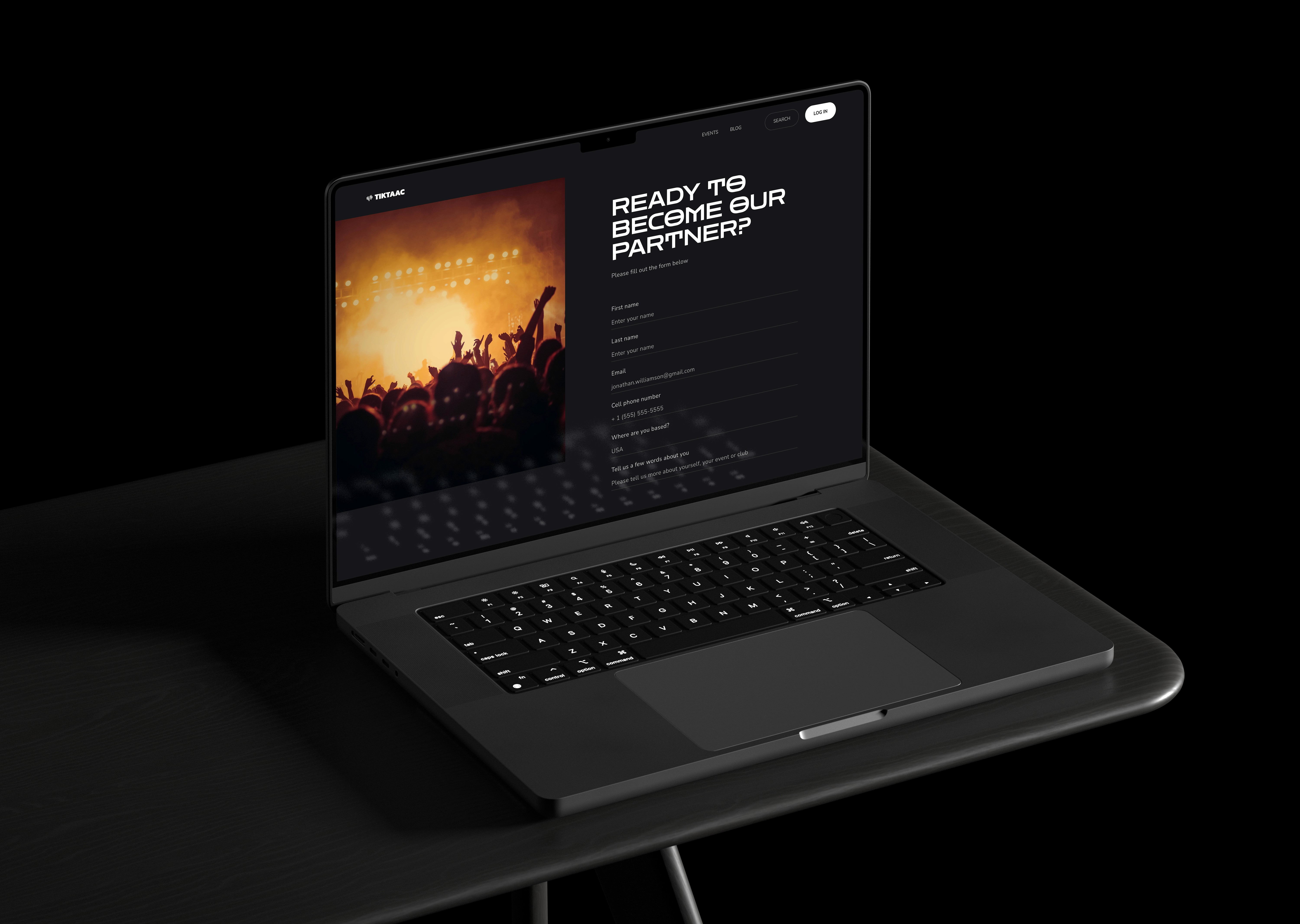 black laptop computer on brown wooden table