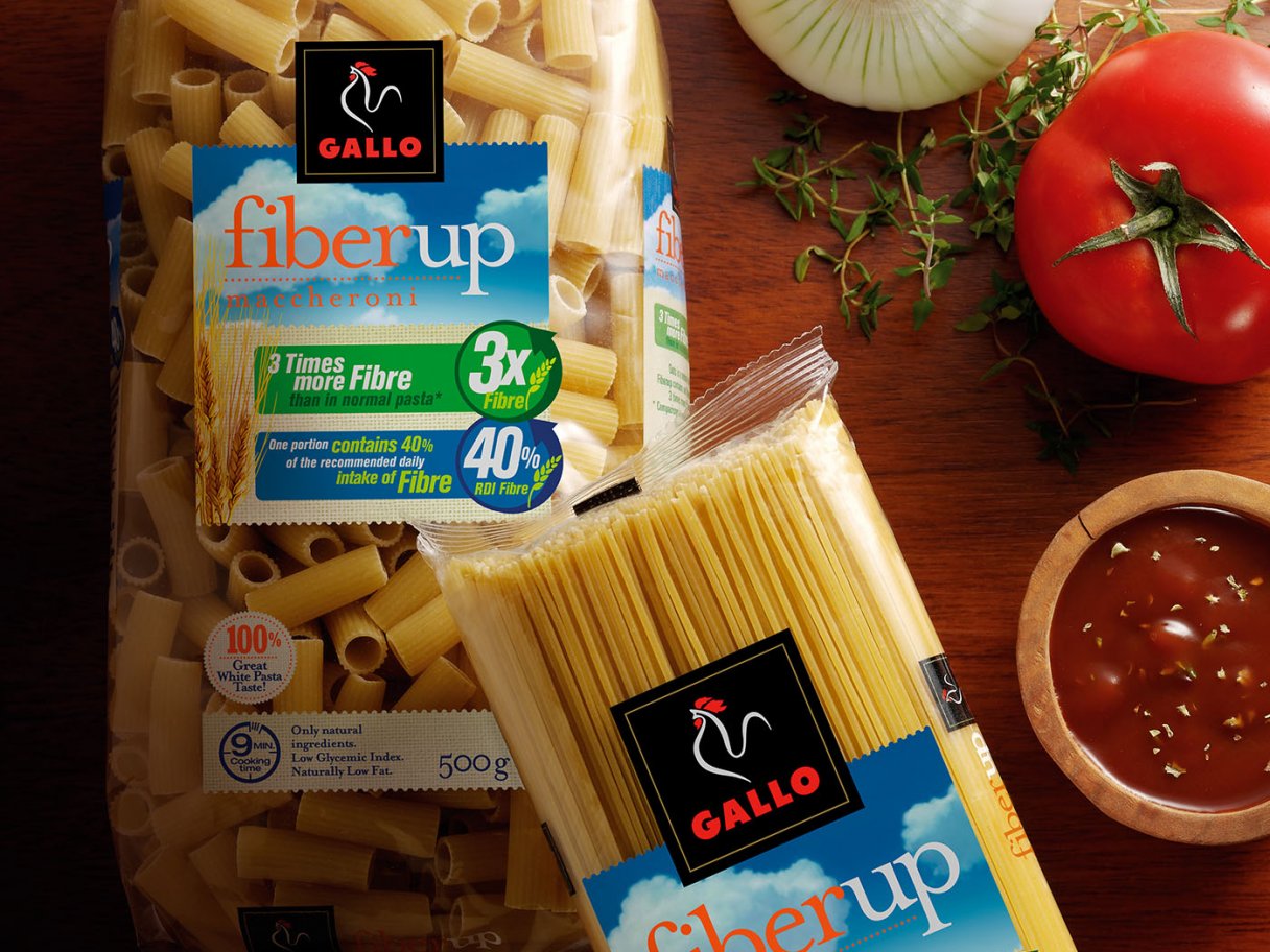 Rustic cabin in a golden field at sunset