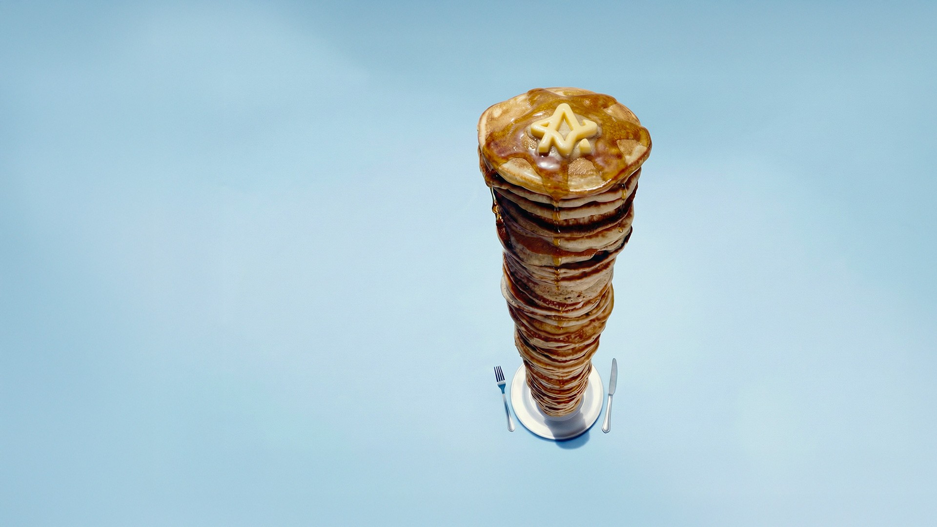 Artistic portrait with red and blue lighting creating a dramatic effect