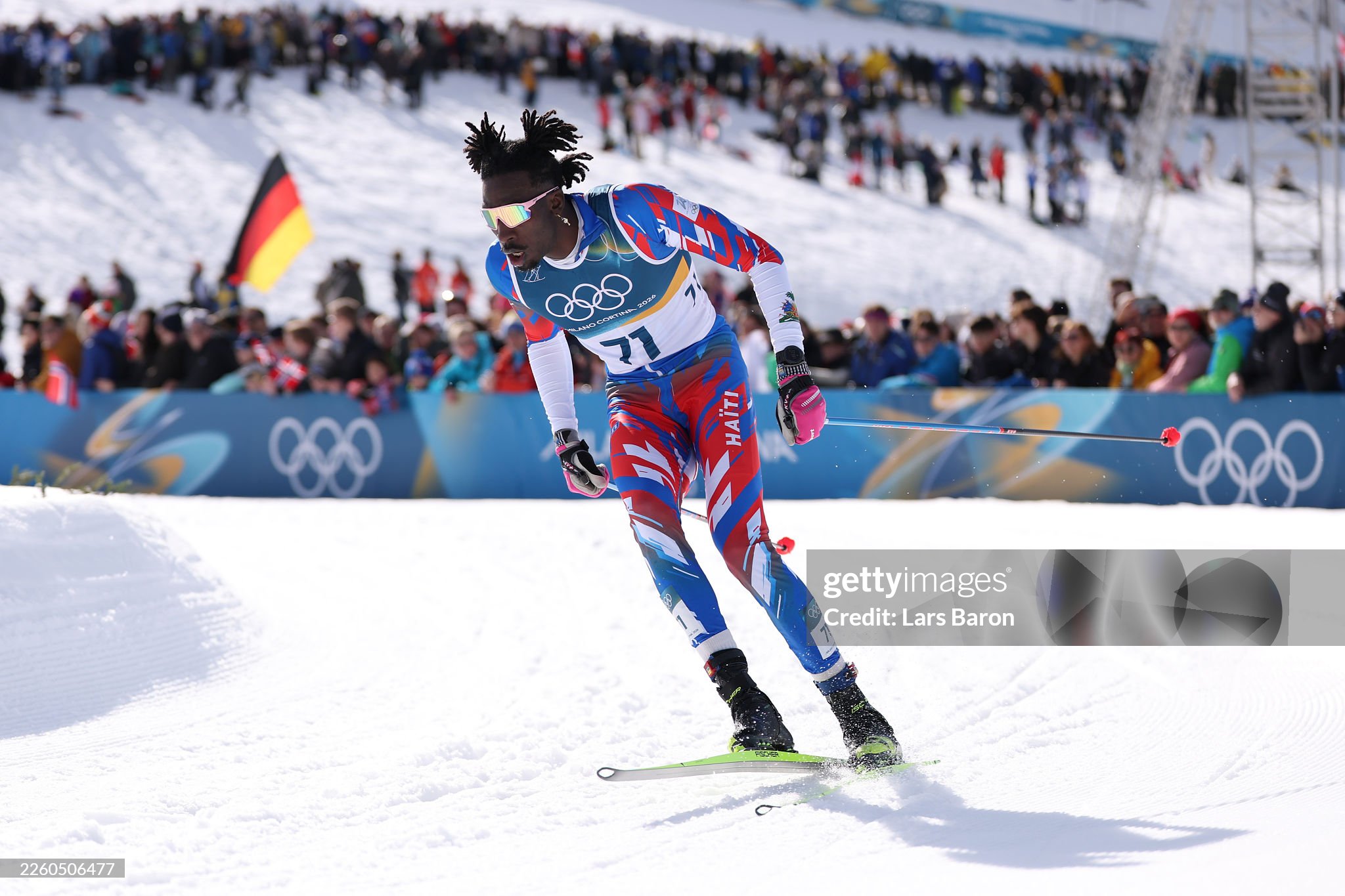Stevenson Savart, skieur de fond représentant Haïti, lors du skiathlon aux Jeux Olympiques d'hiver de Milan-Cortina 2026.