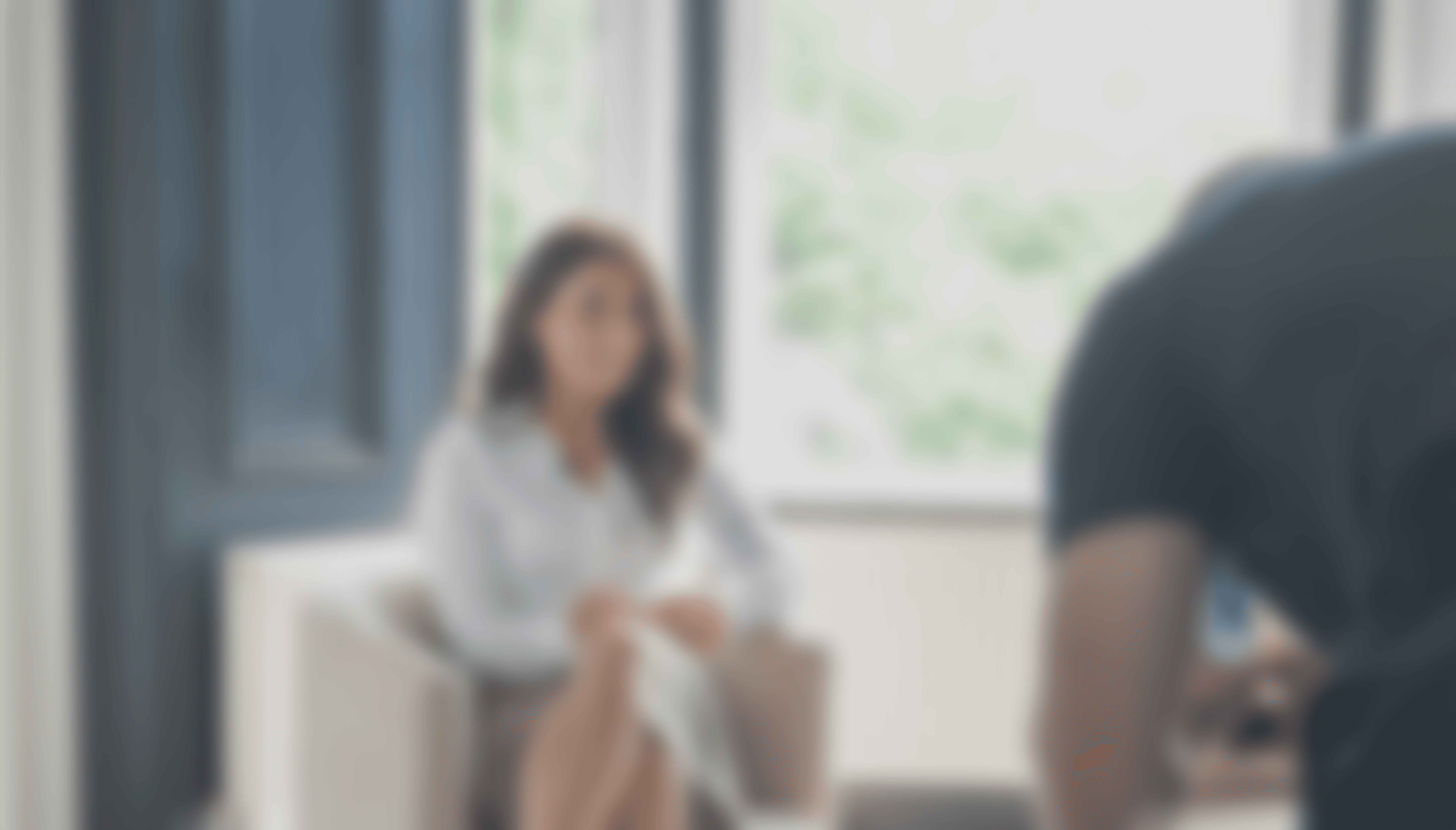 Modern spiral staircase with wooden accents and lighting