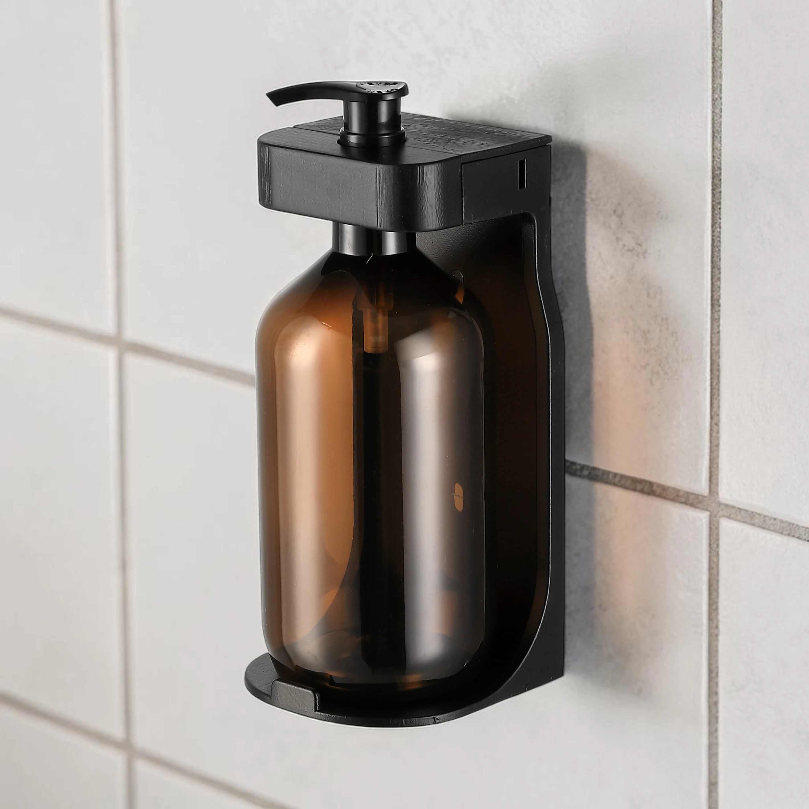 Eco-friendly tamper-proof soap dispenser bracket for hotel refillable systems, high-quality stainless steel, compatible with 300ml-500ml bottles.