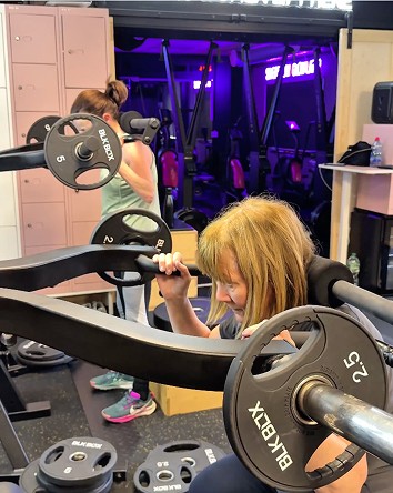 Older women training in the gym