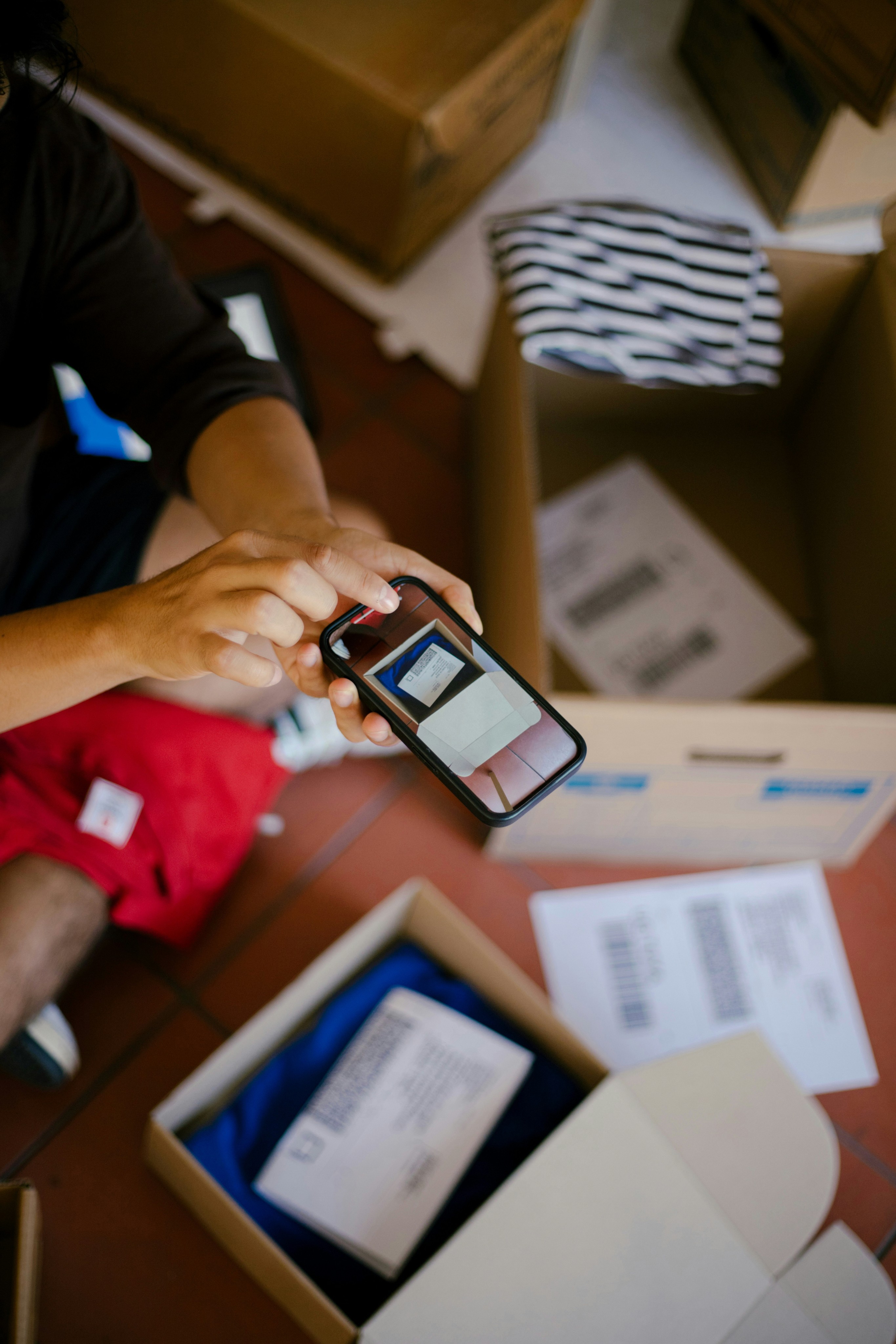 Person drawing a design with a protractor.