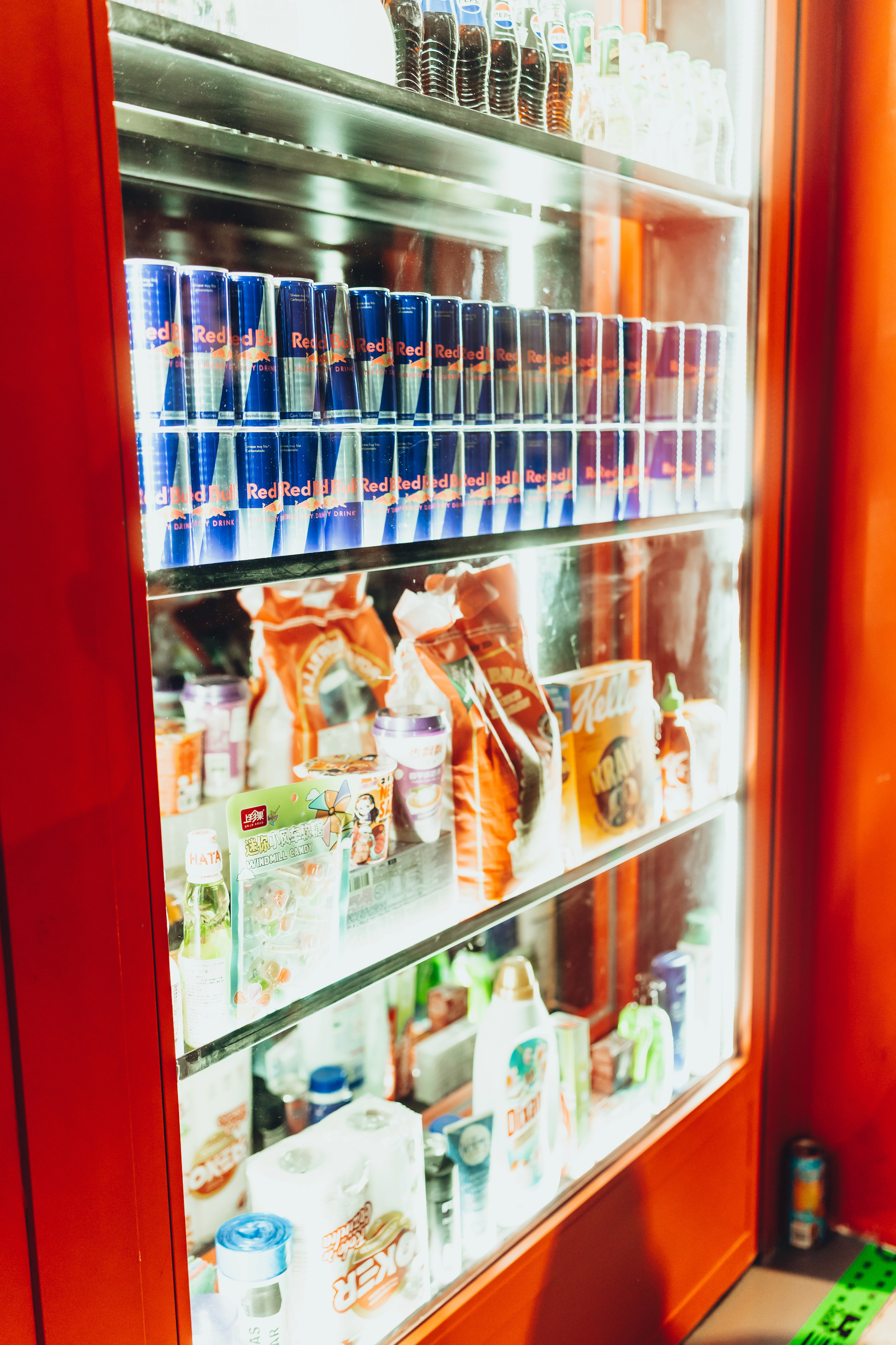 Streetside billboard with flyposters of the Batch.Works brand and illustrations