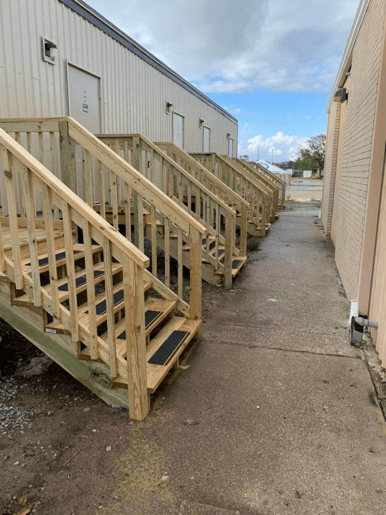 Side walkway and stair access between modular housing units at the Ochsner Chabert emergency housing site.