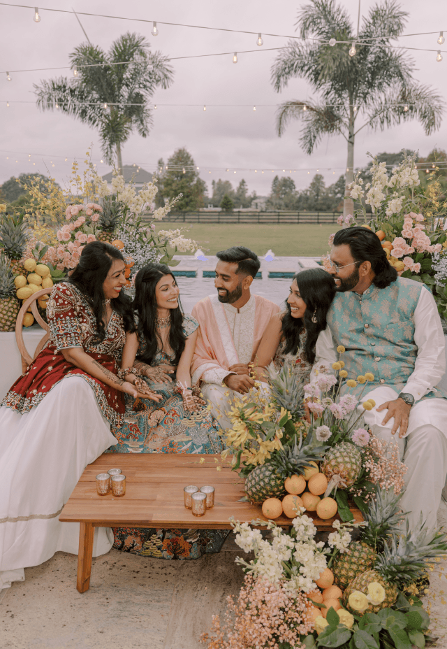 Wedding guest laughing and enjoying the reception music