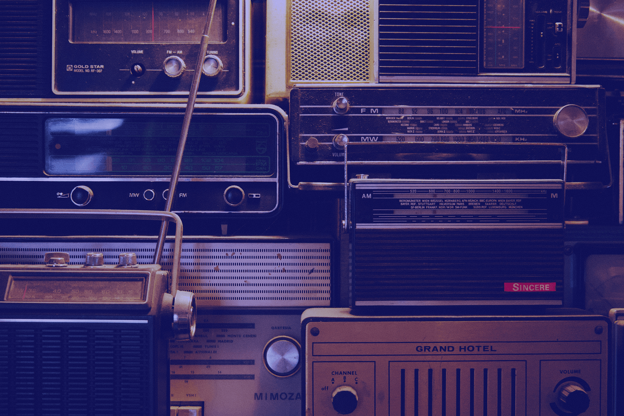 Multiple vintage radio players.