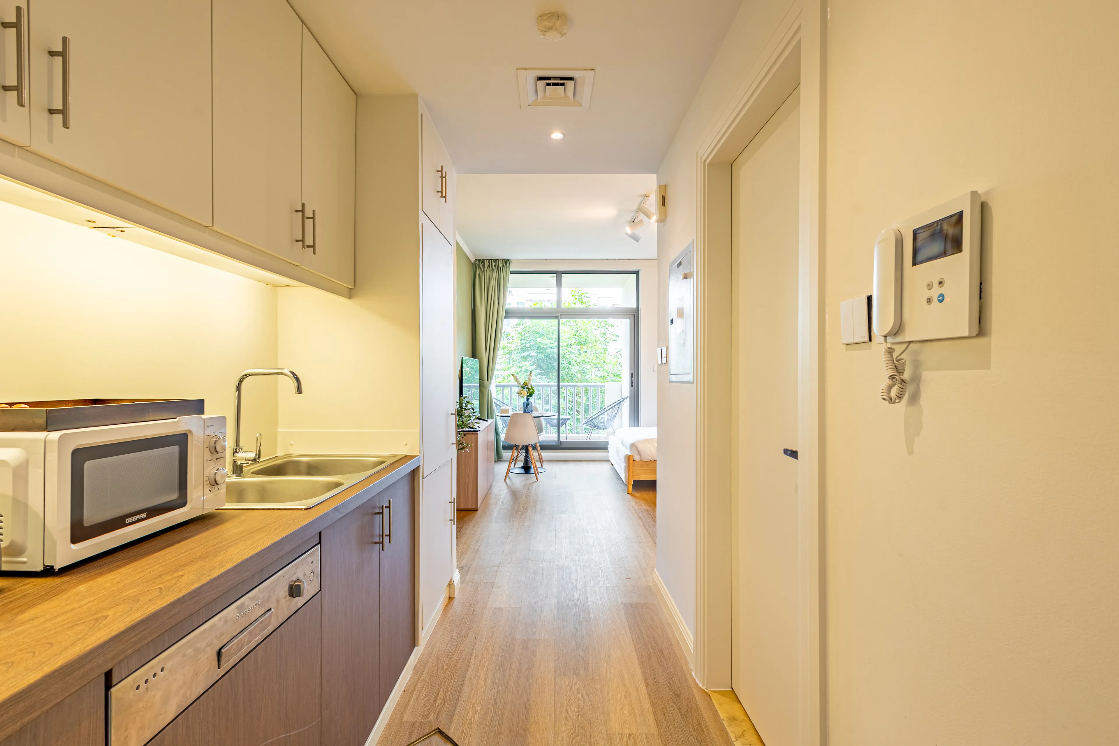 Horizontal picture of an apartment from the kitchen.