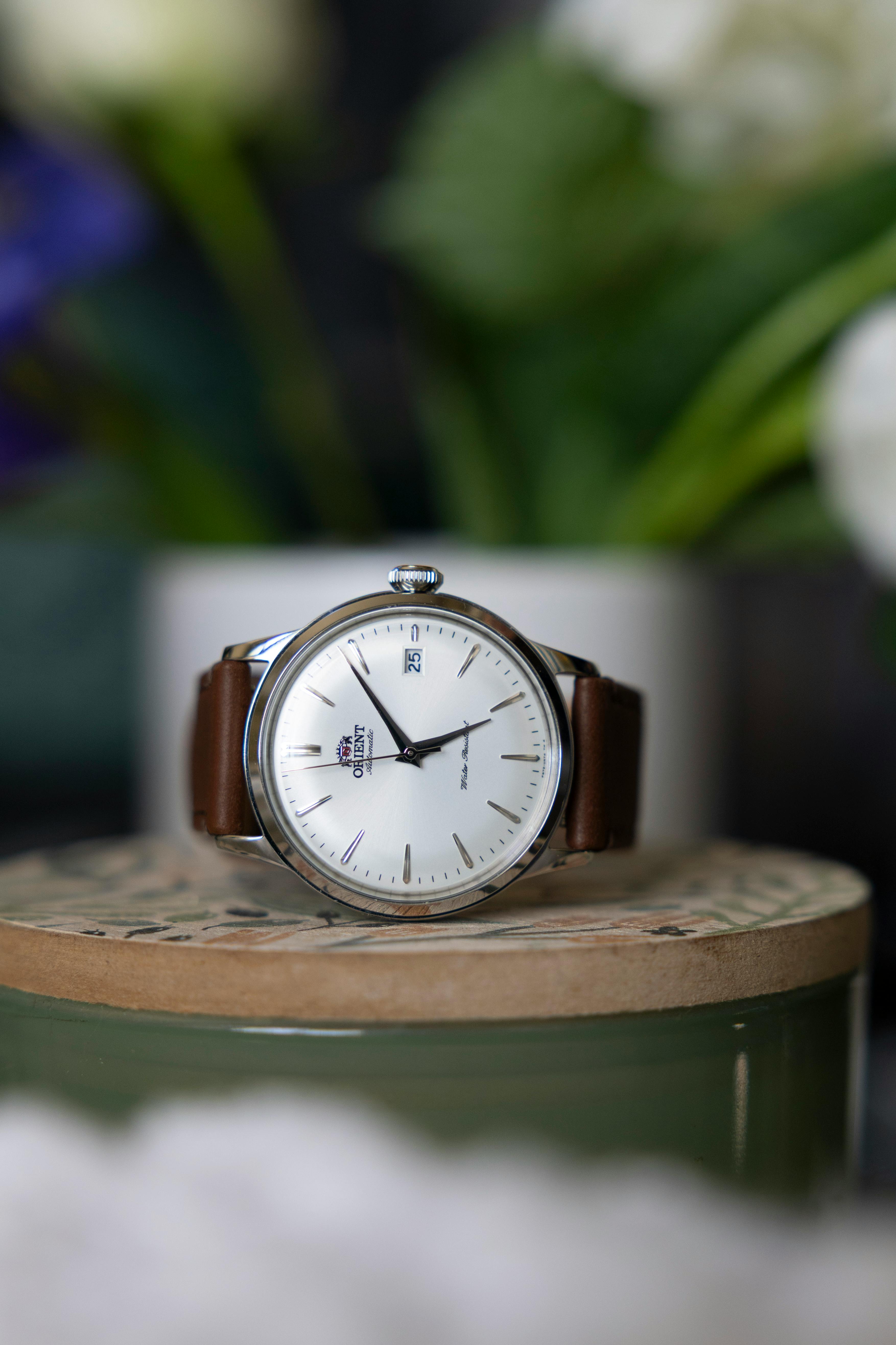 Orient Bambino automatic watch with a white dial and date function